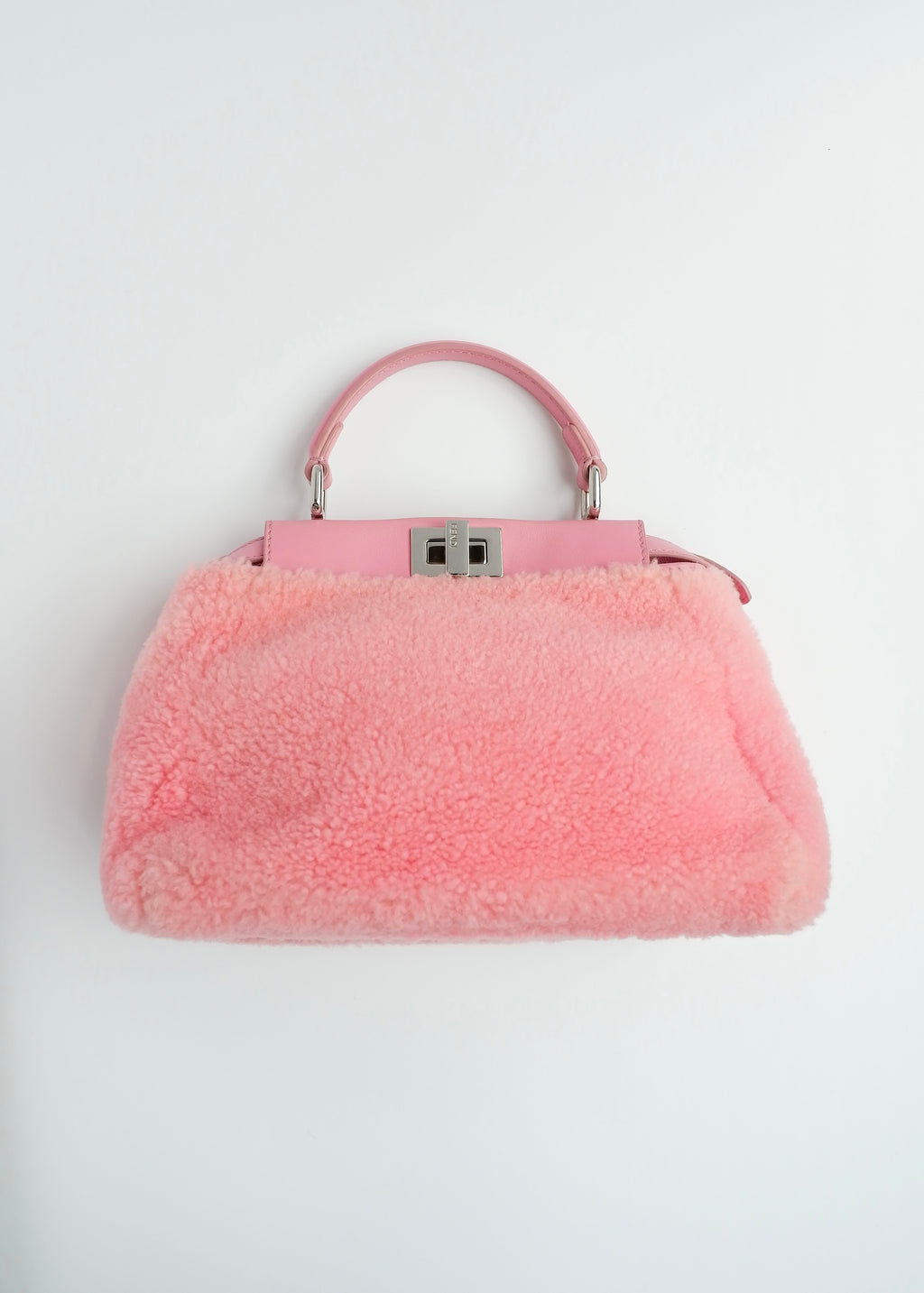 Authentique sac Fendi Peekaboo petit modèle en shearling rose et cuir, d'occasion