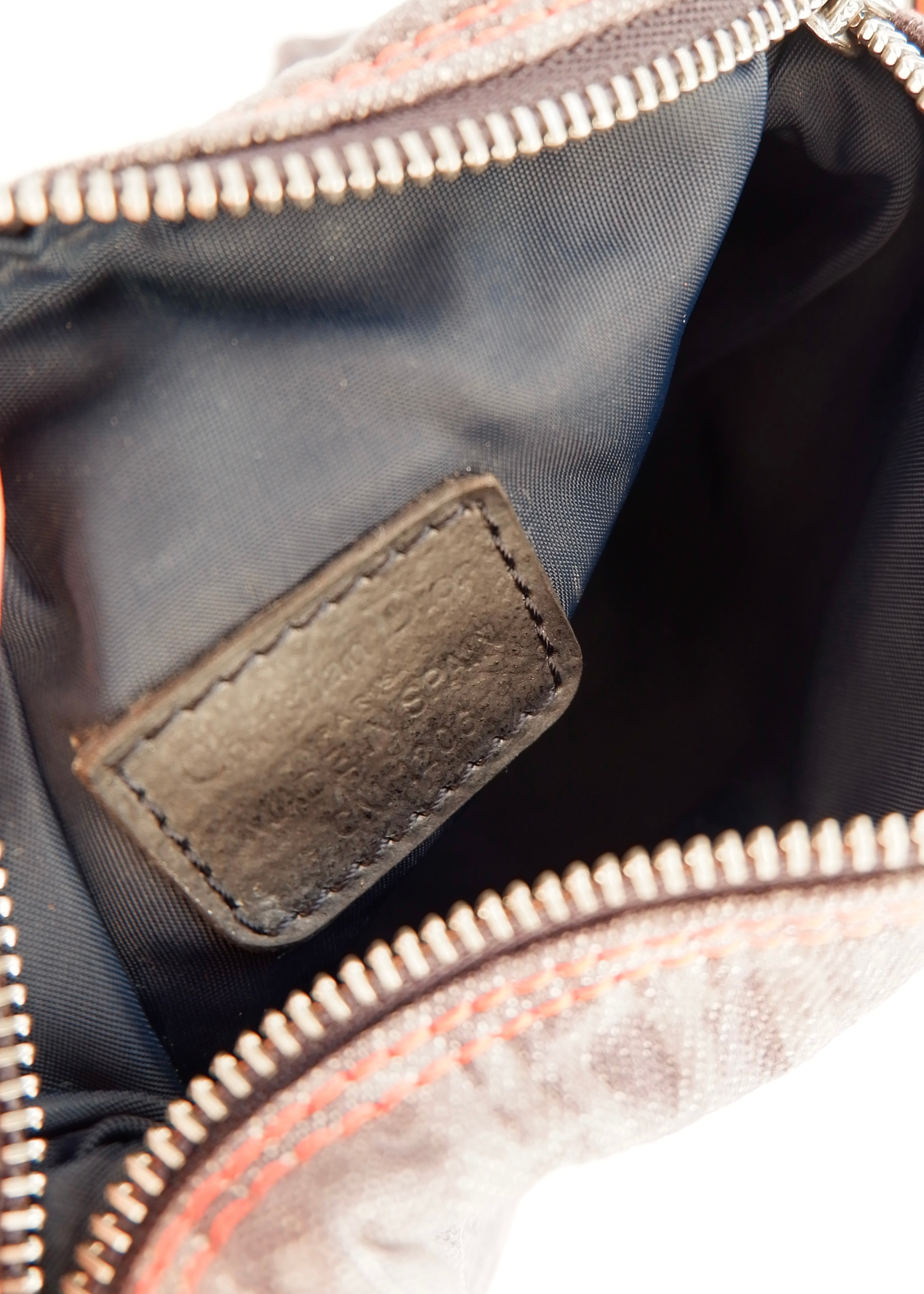 Pochette Dior en jean bleu marine motif Oblique, d'occasion et authentique