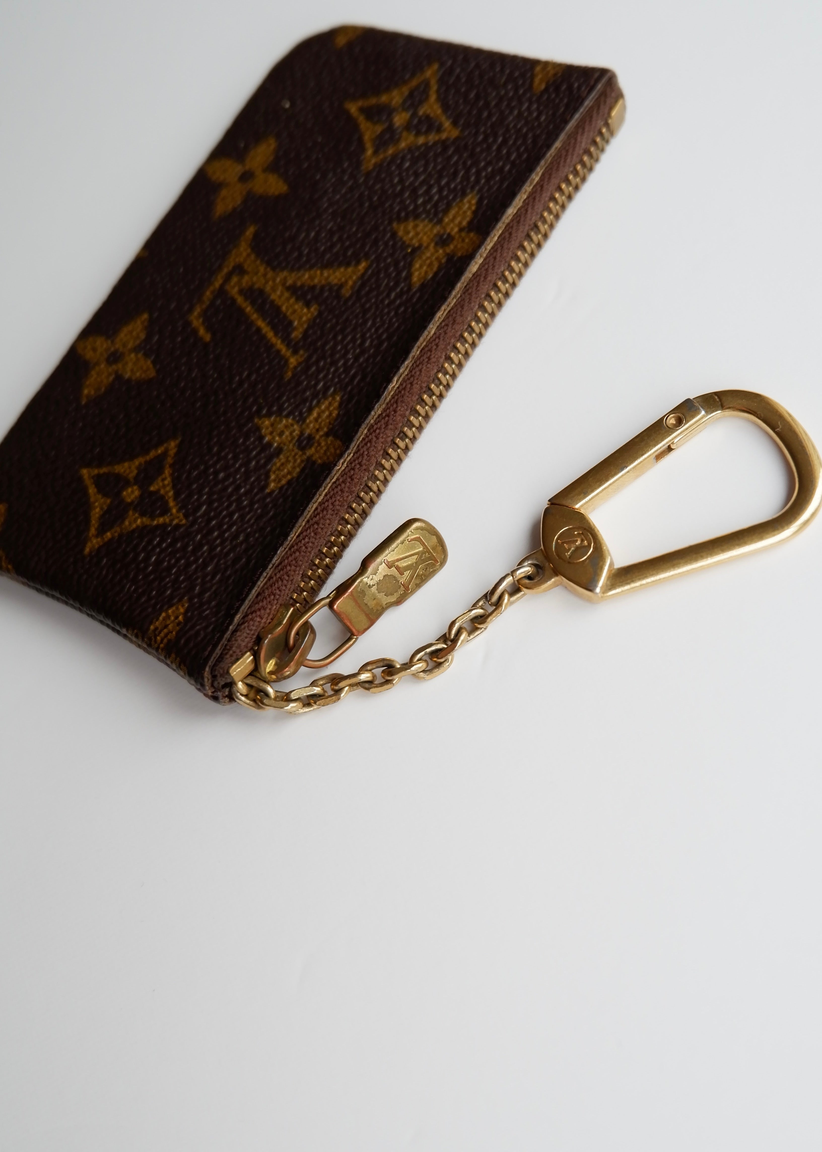 Authentique pochette à clés monogramme Louis Vuitton d'occasion