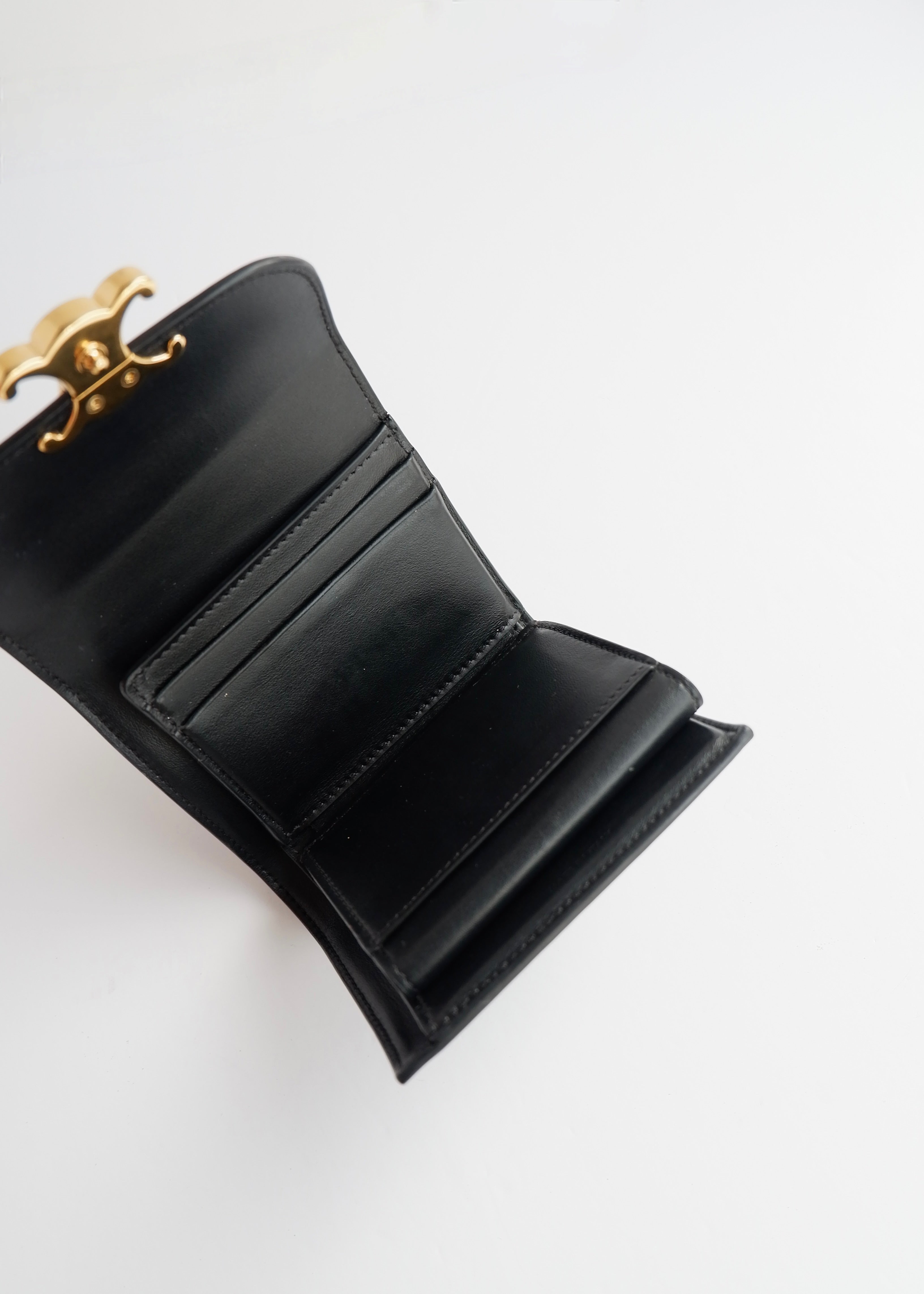 Portefeuille Celine Triomphe noir authentique d'occasion
