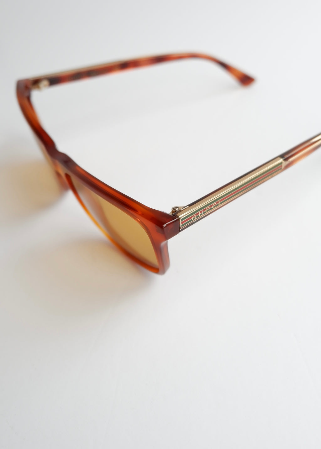 Authentiques Lunettes de soleil Gucci d'occasion en acétate marron à monture carrée