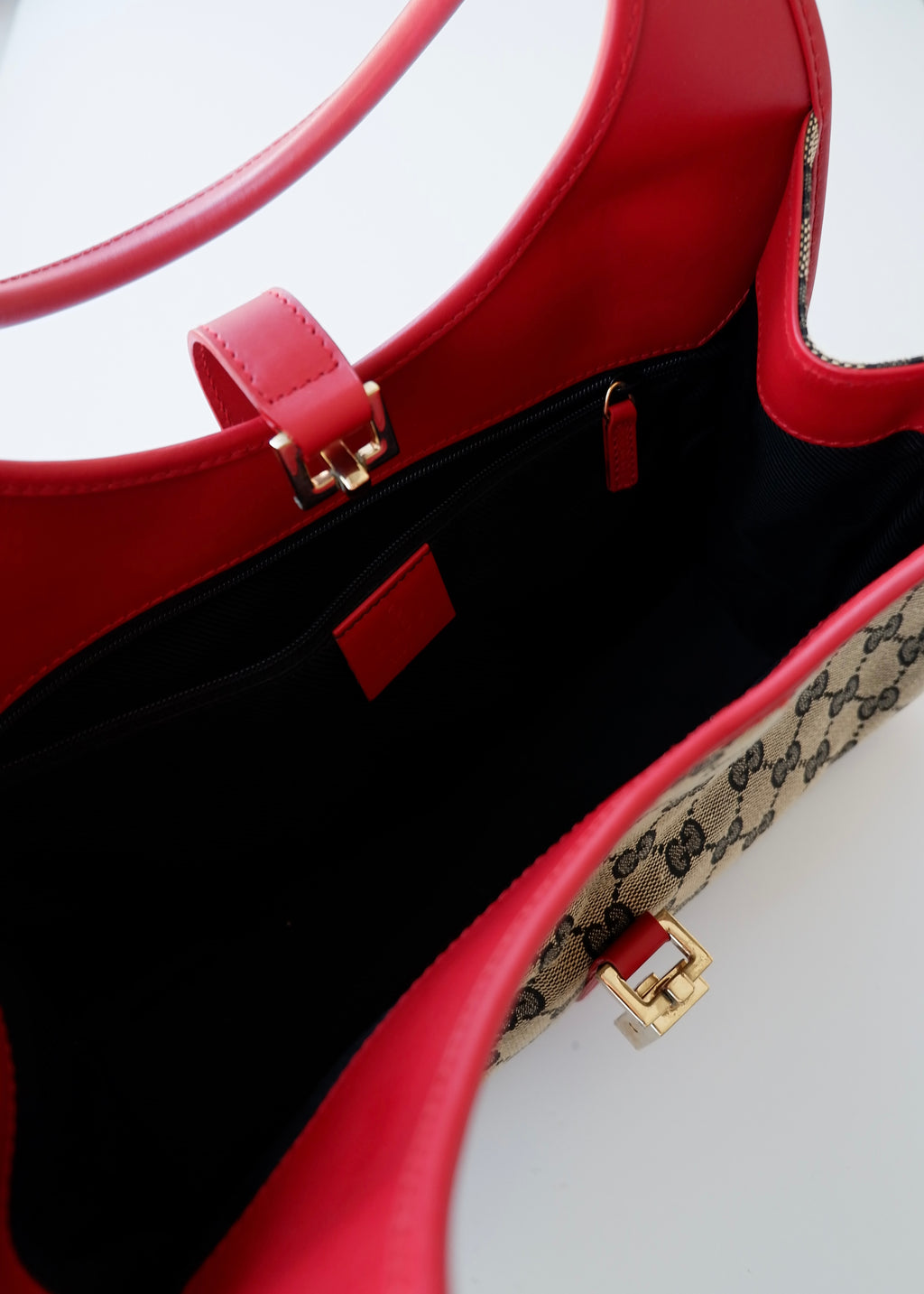 Preowned Gucci Red GG Canvas Jackie Piston Closure Shoulder Bag