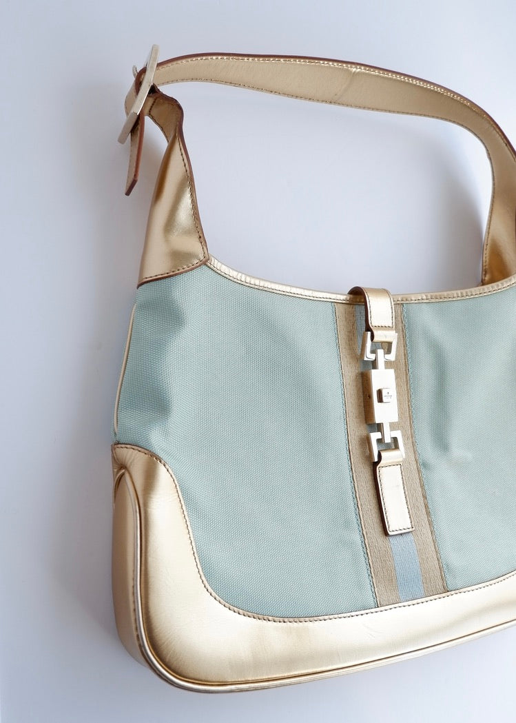 Authentique sac à bandoulière Gucci Jackie bleu/doré d'occasion