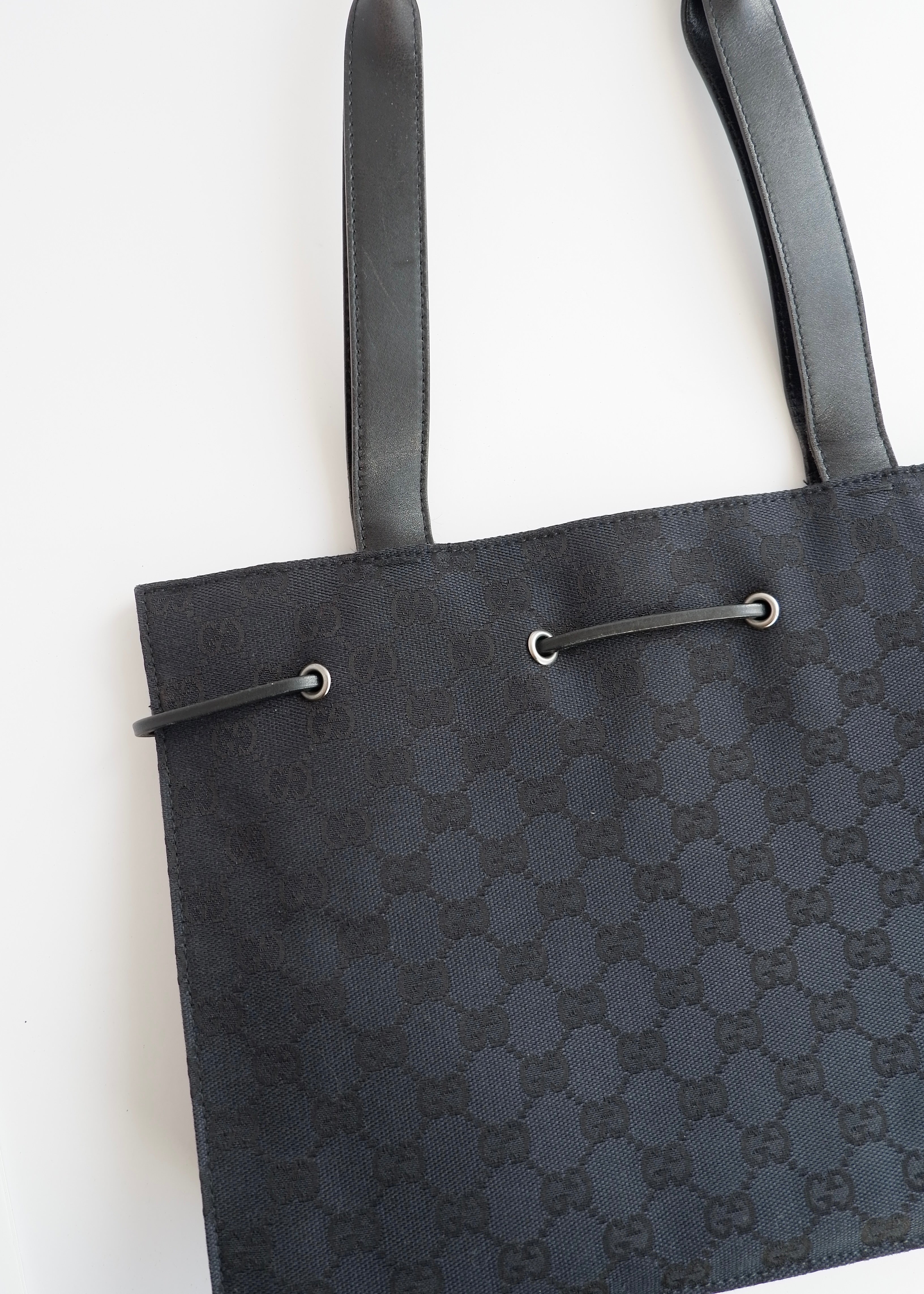 Authentic Preowned Vintage Gucci Black GG Canvas Drawstring Shoulder Bag