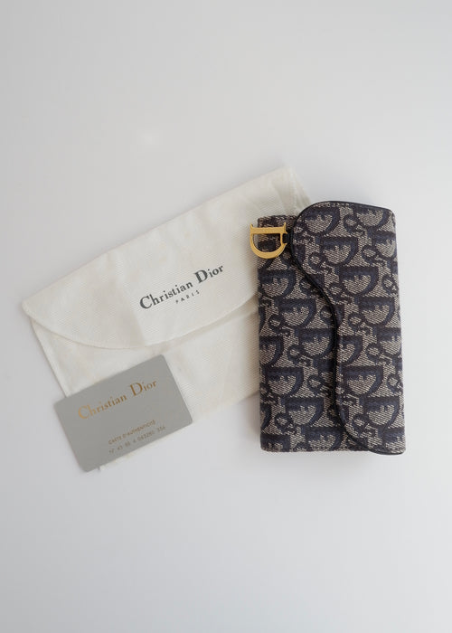 Portefeuille Dior authentique d'occasion en toile trotteur bleu marine