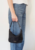 Sac à bandoulière micro Prada noir en nylon d'occasion authentique avec pochette