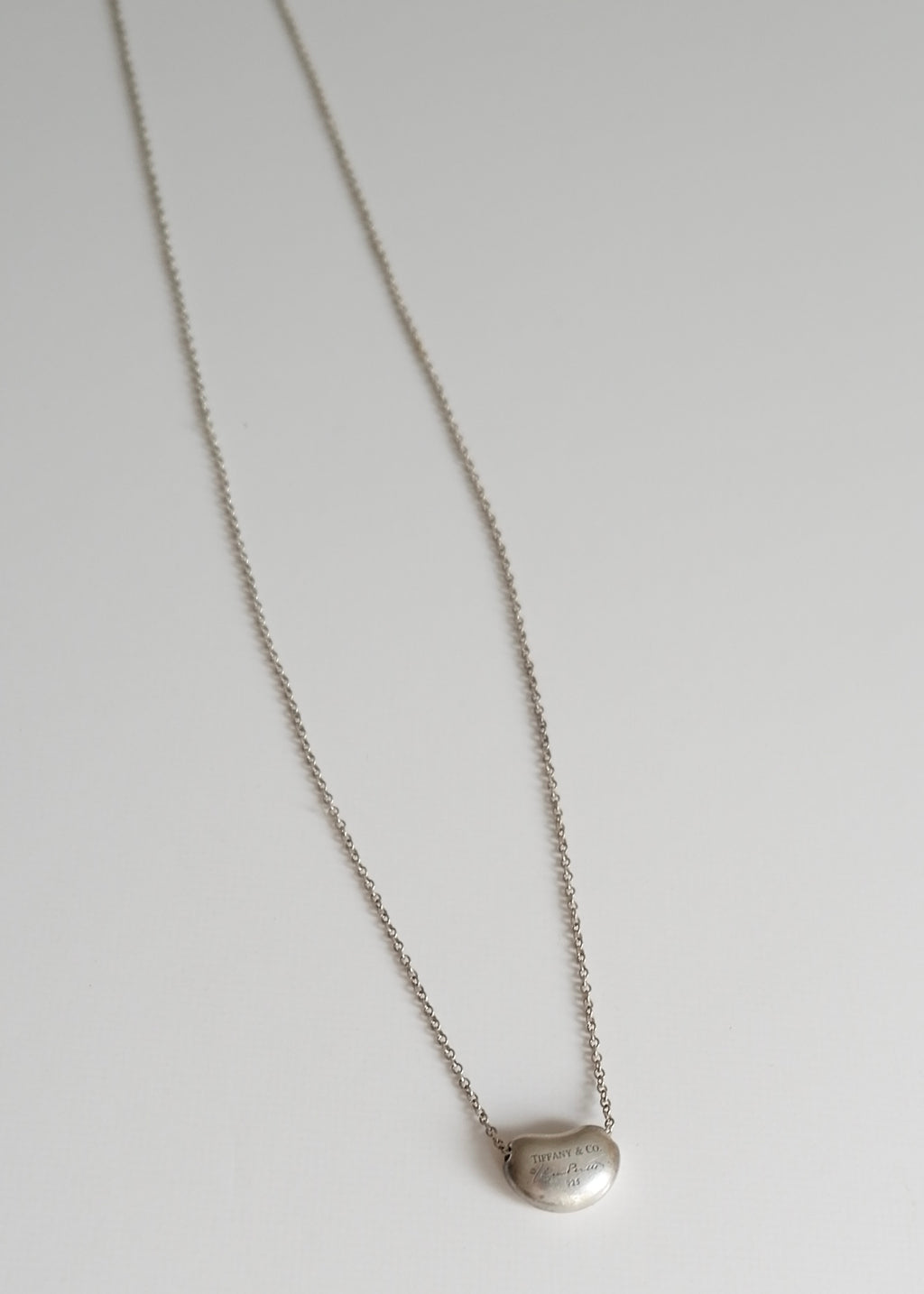 Authentique collier Tiffany en argent avec pendentif haricot d'occasion