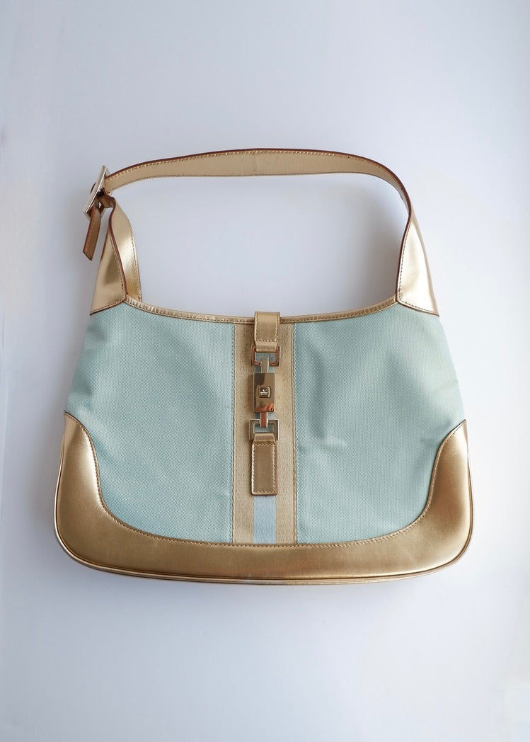 Authentique sac à bandoulière Gucci Jackie bleu/doré d'occasion