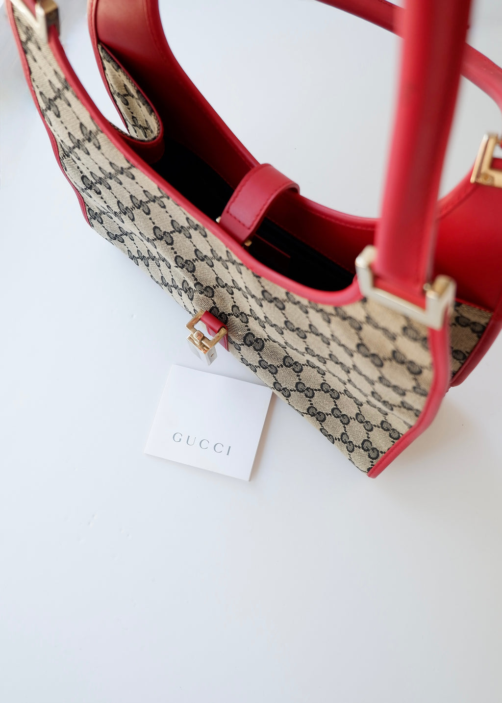 Preowned Gucci Red GG Canvas Jackie Piston Closure Shoulder Bag