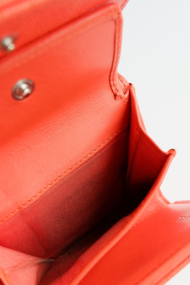 Portefeuille Chanel Boy d'occasion authentique en cuir grainé orange