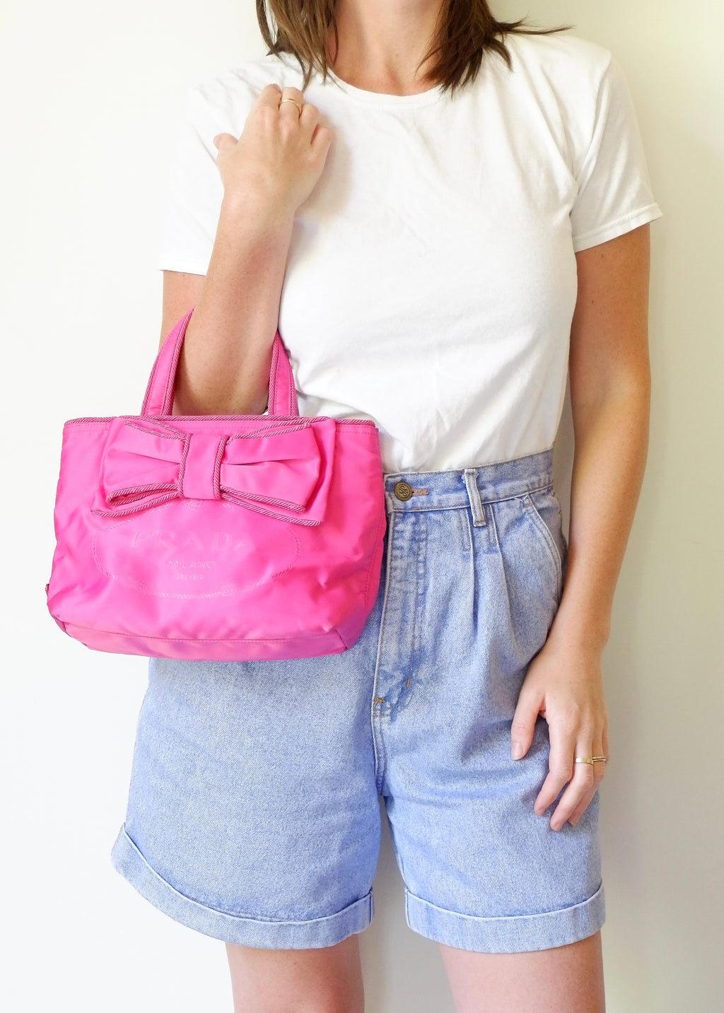 Authentique sac Prada deux façons en nylon rose vif d'occasion