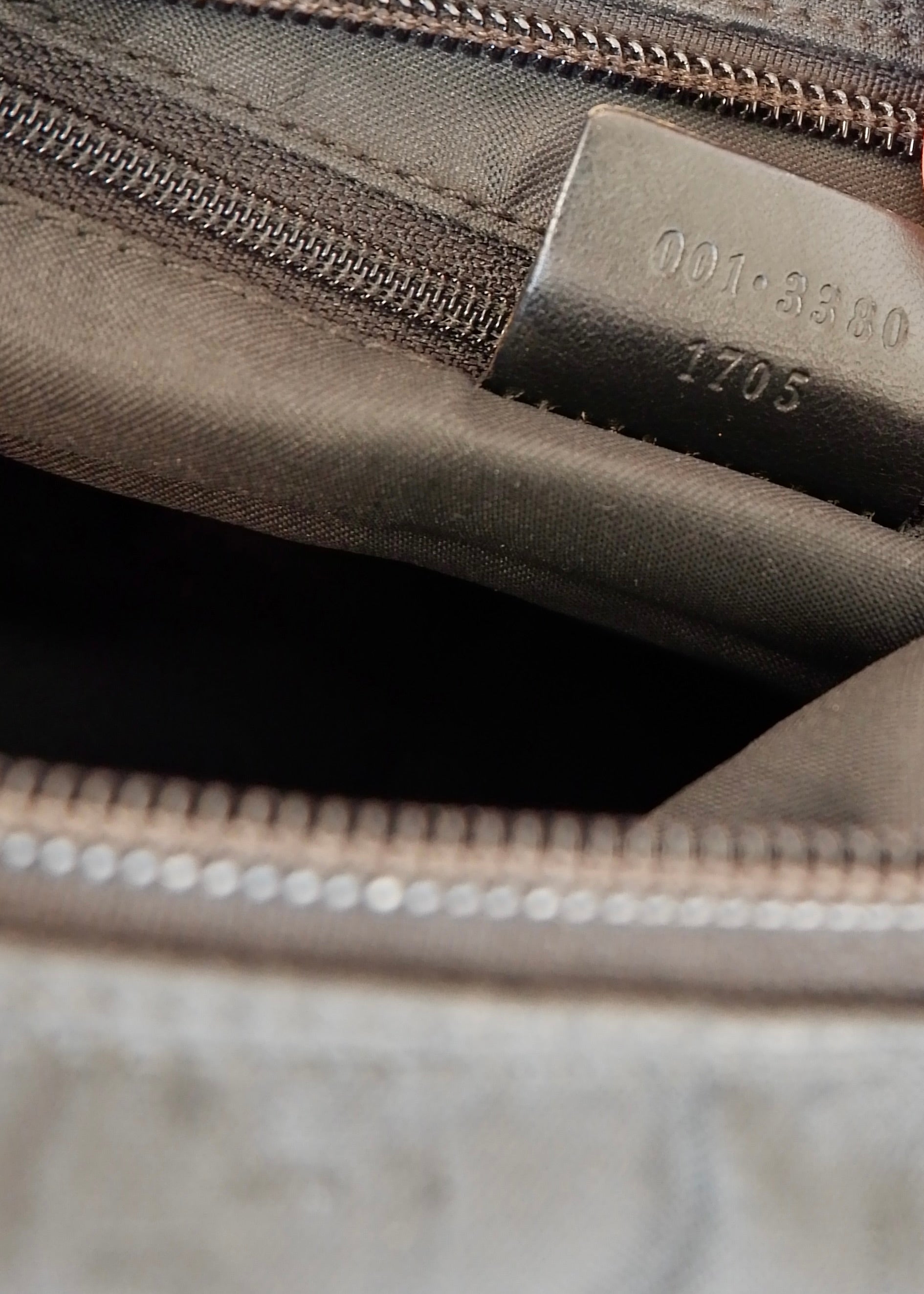 Authentique Sac à bandoulière Gucci en toile GG noire d'occasion