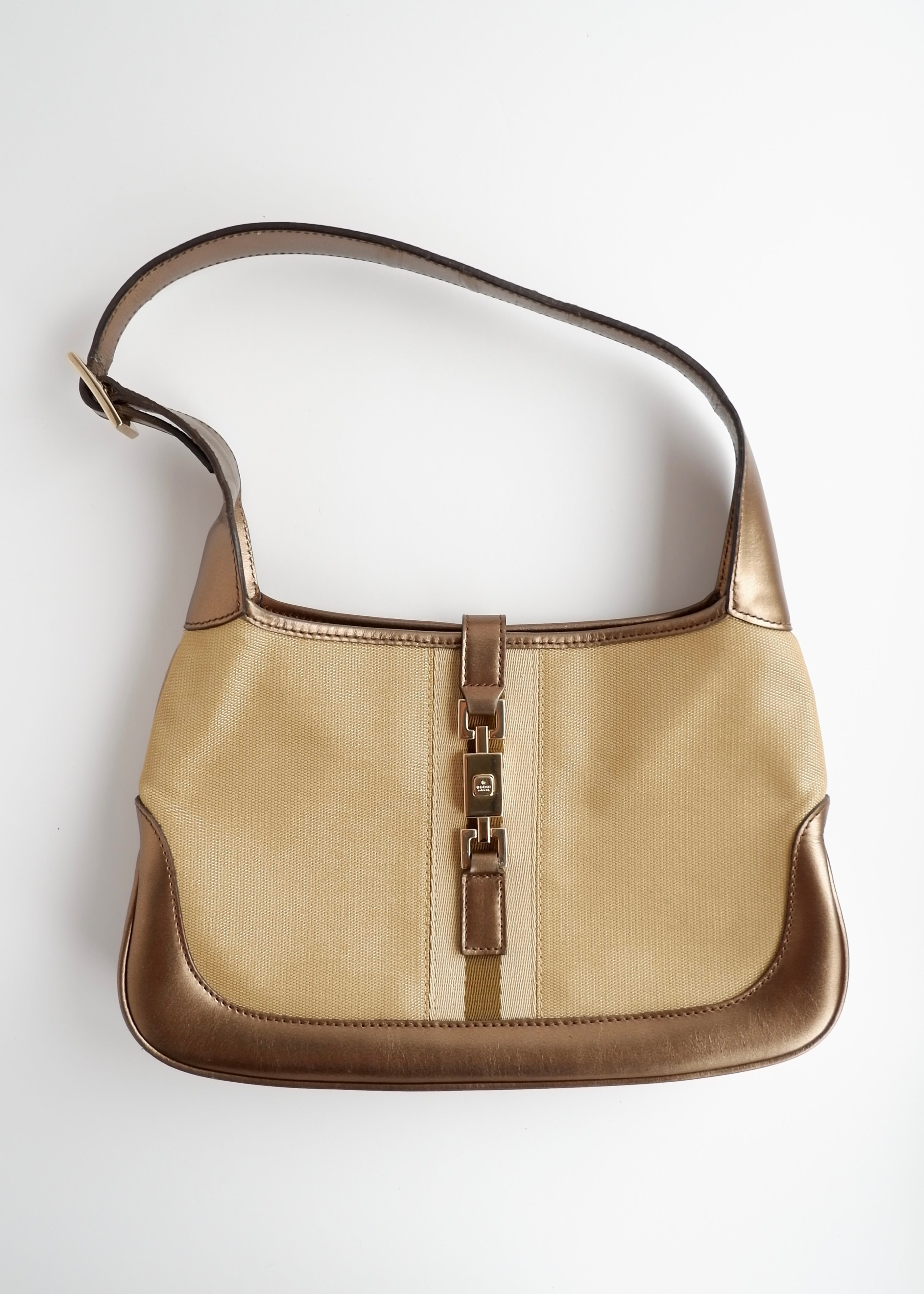 Authentique Sac Jackie Gucci d'occasion en Toile et Cuir Doré/Beige