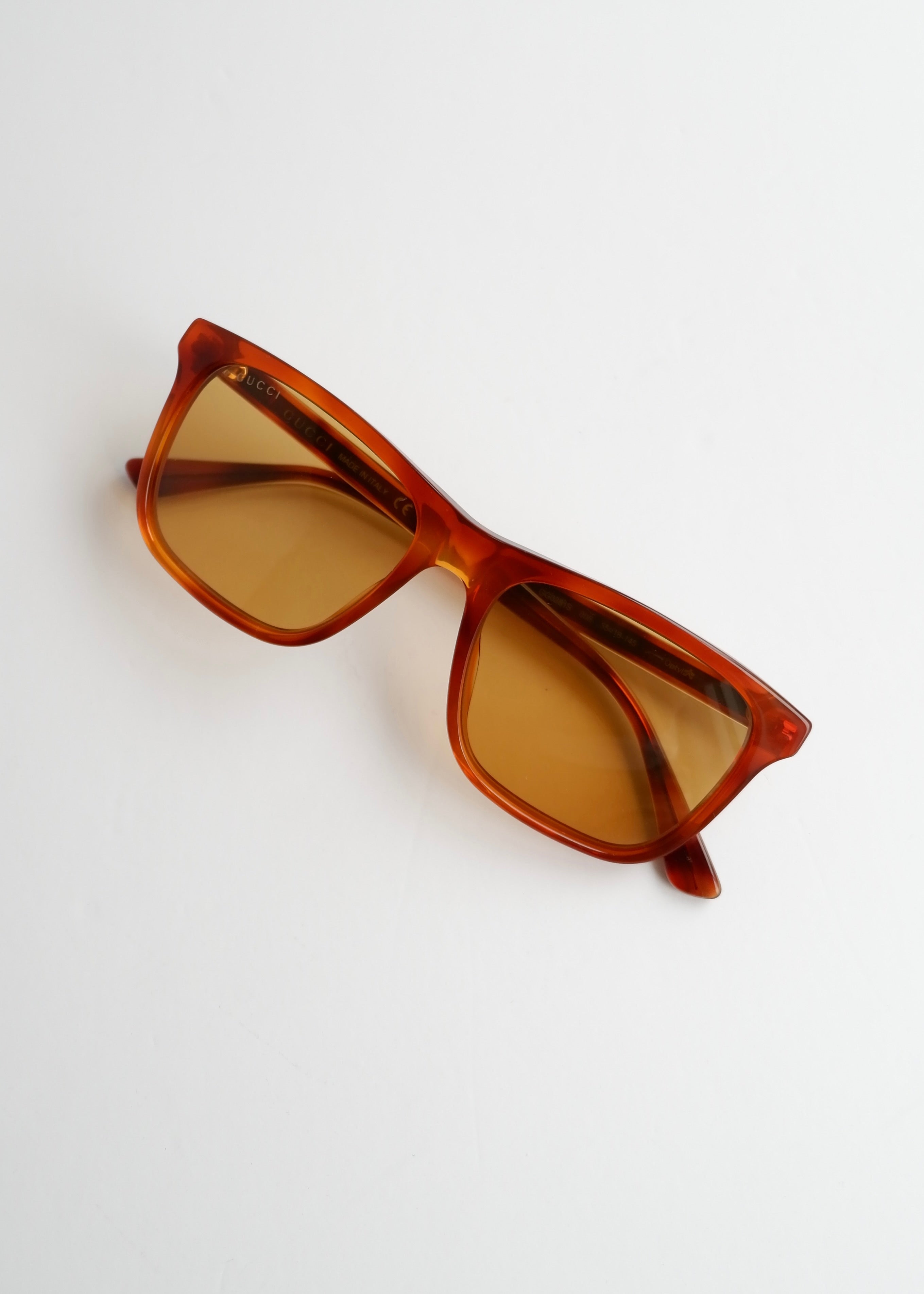 Authentiques Lunettes de soleil Gucci d'occasion en acétate marron à monture carrée