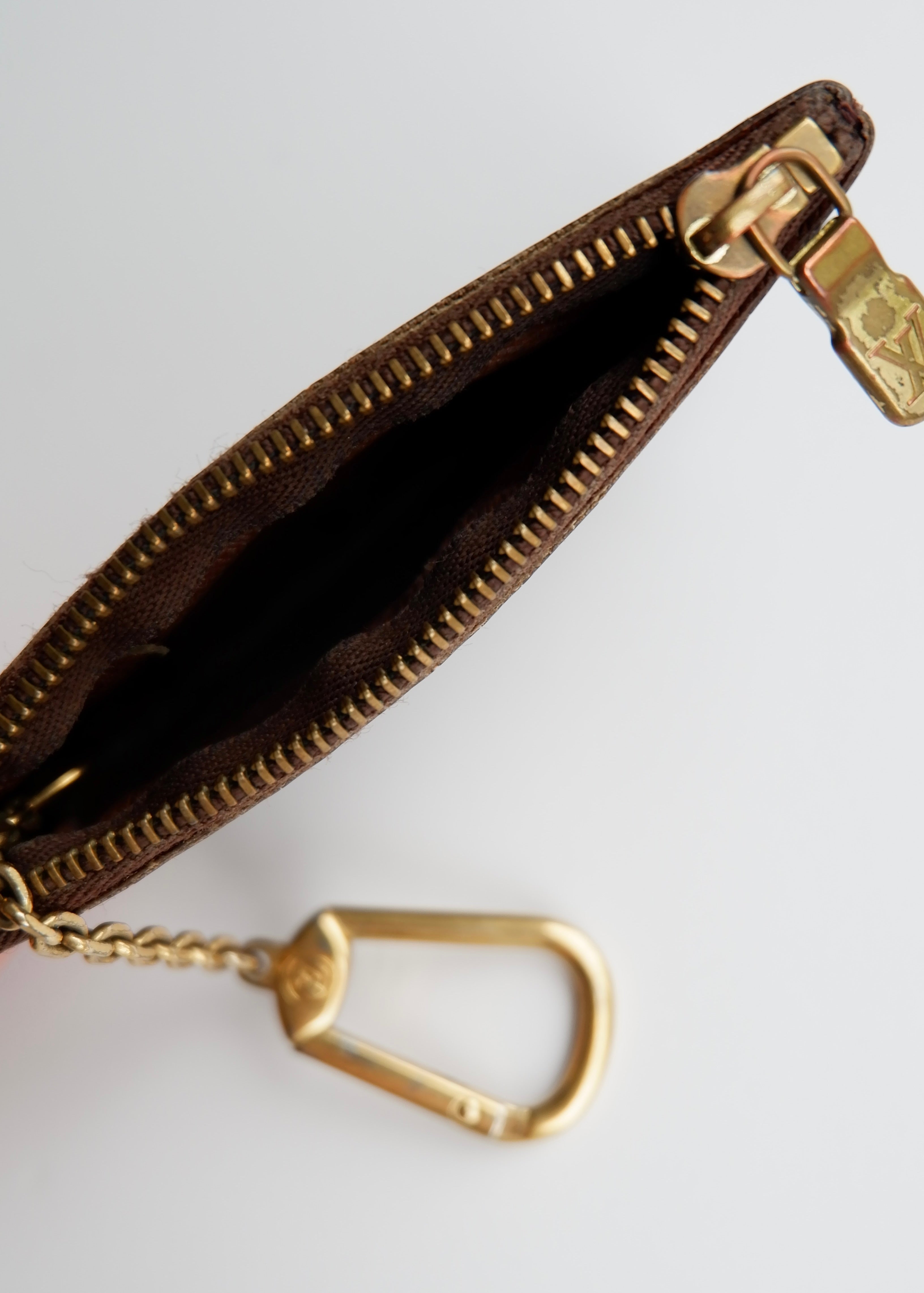 Authentique pochette à clés monogramme Louis Vuitton d'occasion