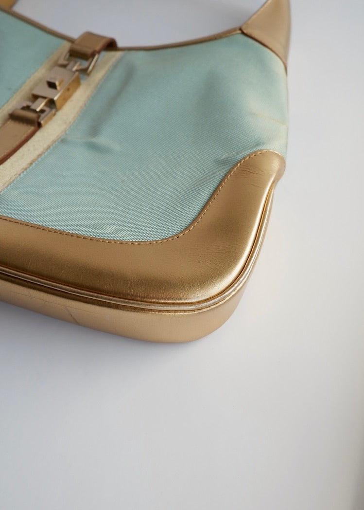 Authentique sac à bandoulière Gucci Jackie bleu/doré d'occasion