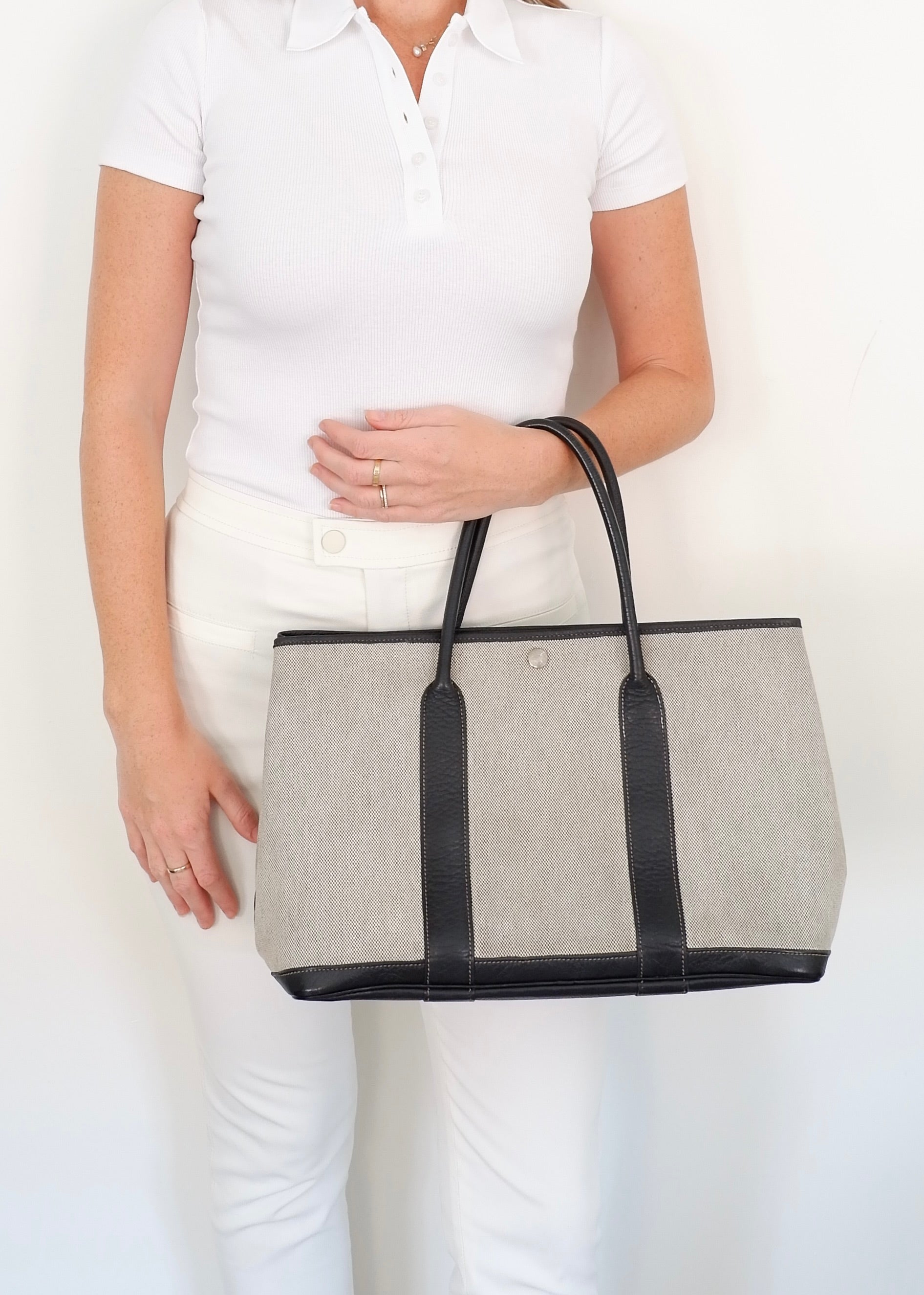Sac cabas Hermès Garden Party authentique d'occasion en cuir et toile noirs/gris