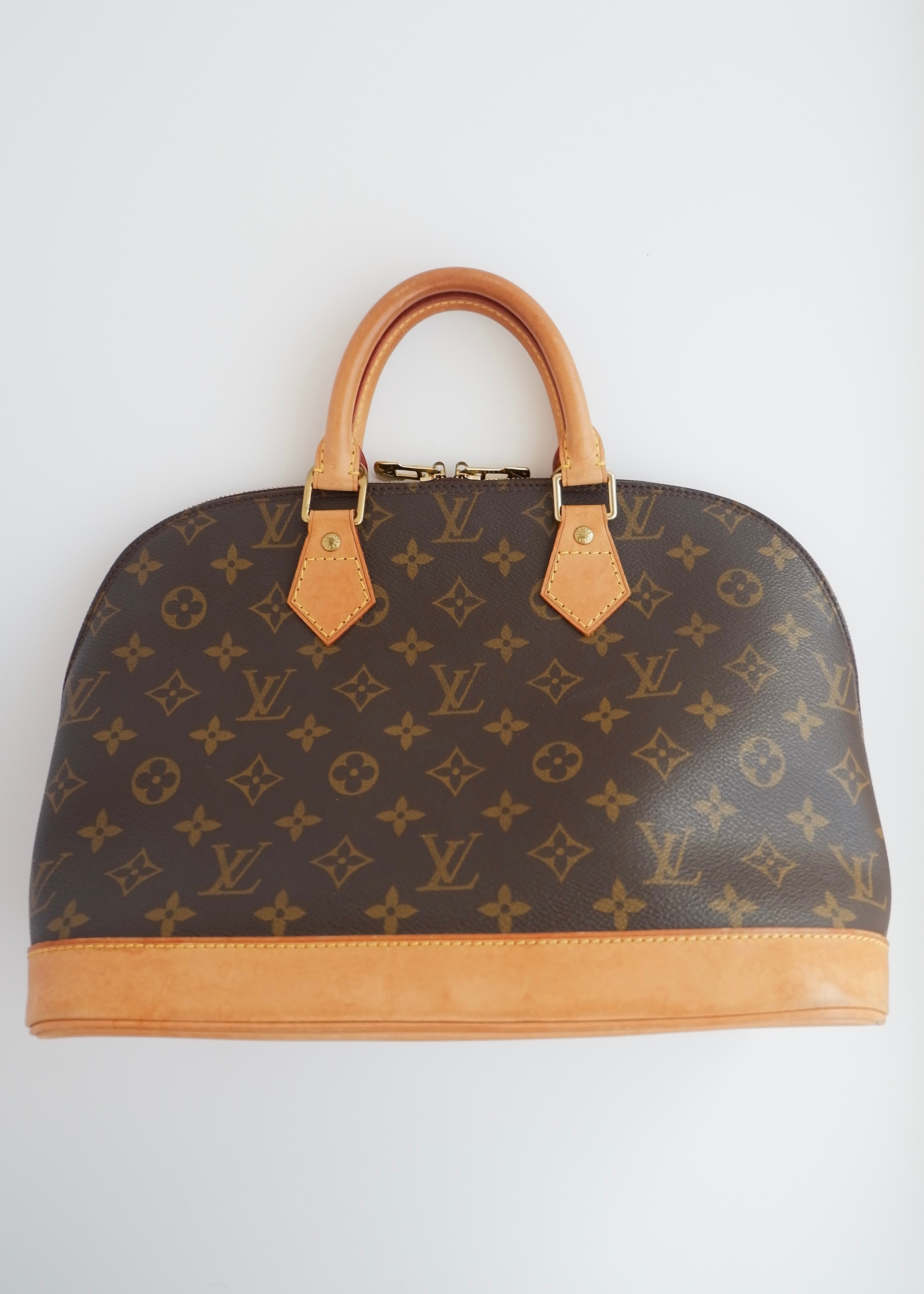 Sac à main Louis Vuitton Alma Monogram d'occasion authentique
