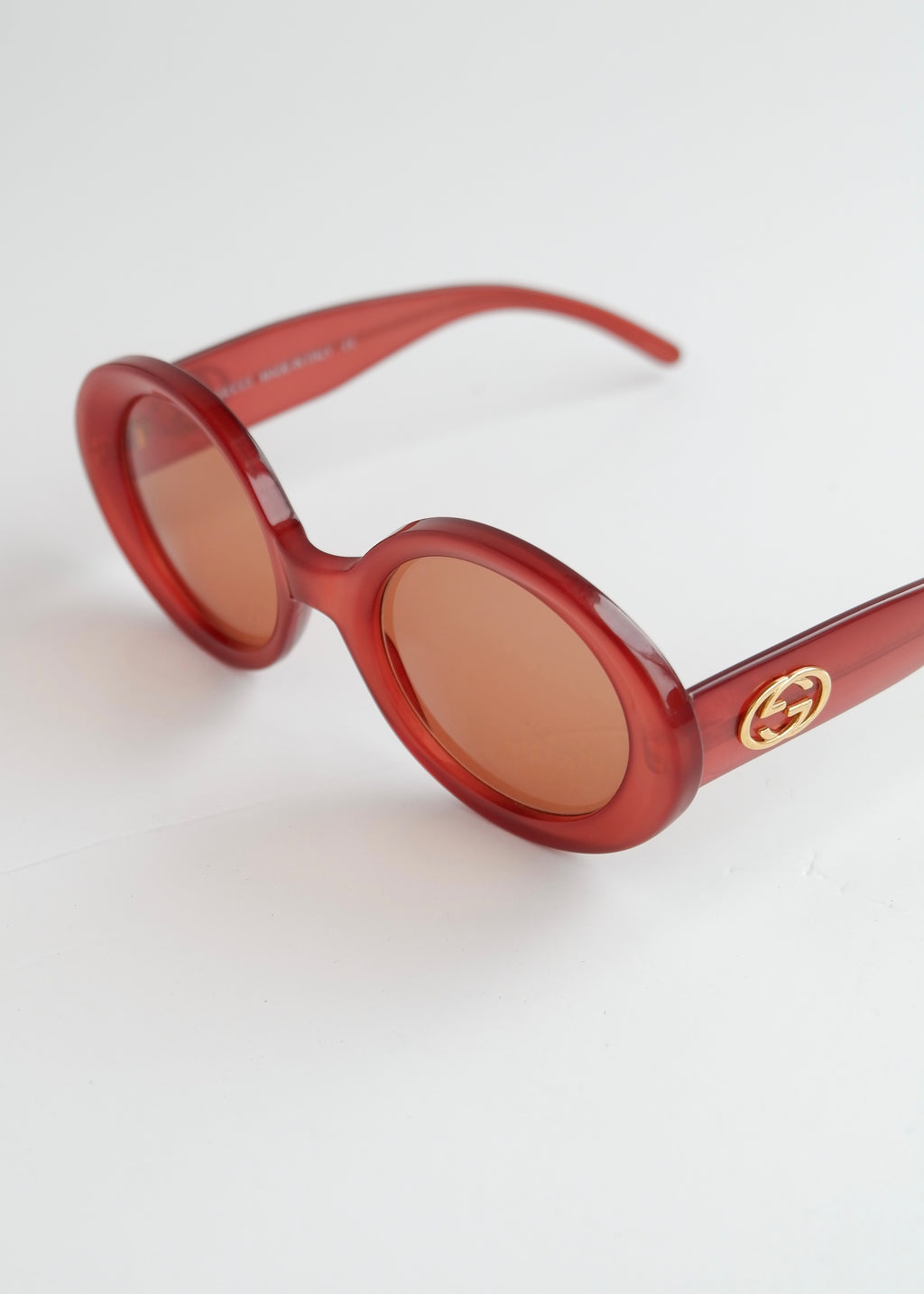 Authentiques lunettes de soleil Gucci rouges à monture ronde d'occasion