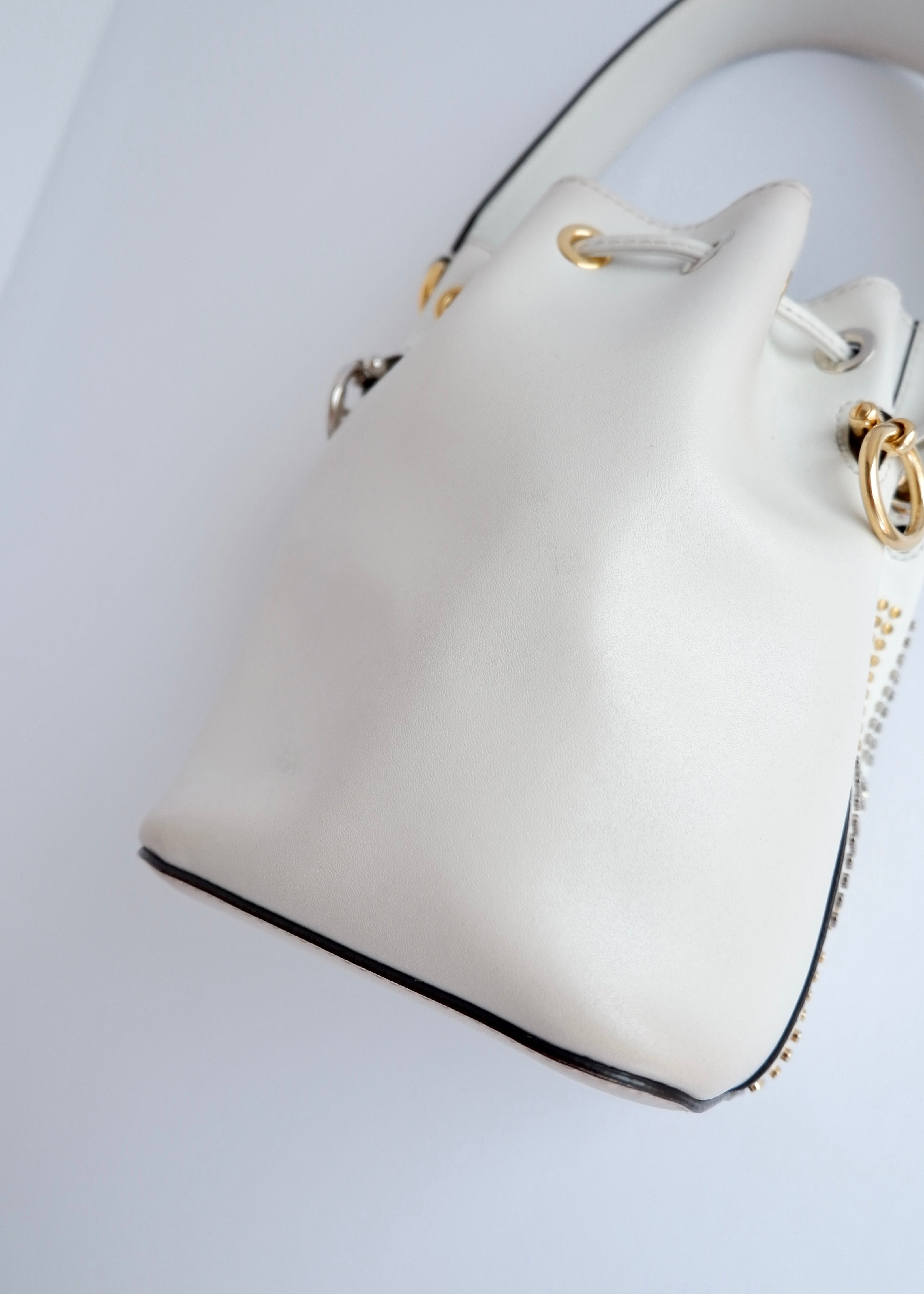 Authentic Preowned Fendi White Leather Zucca Studded Drawstring Bucket Bag