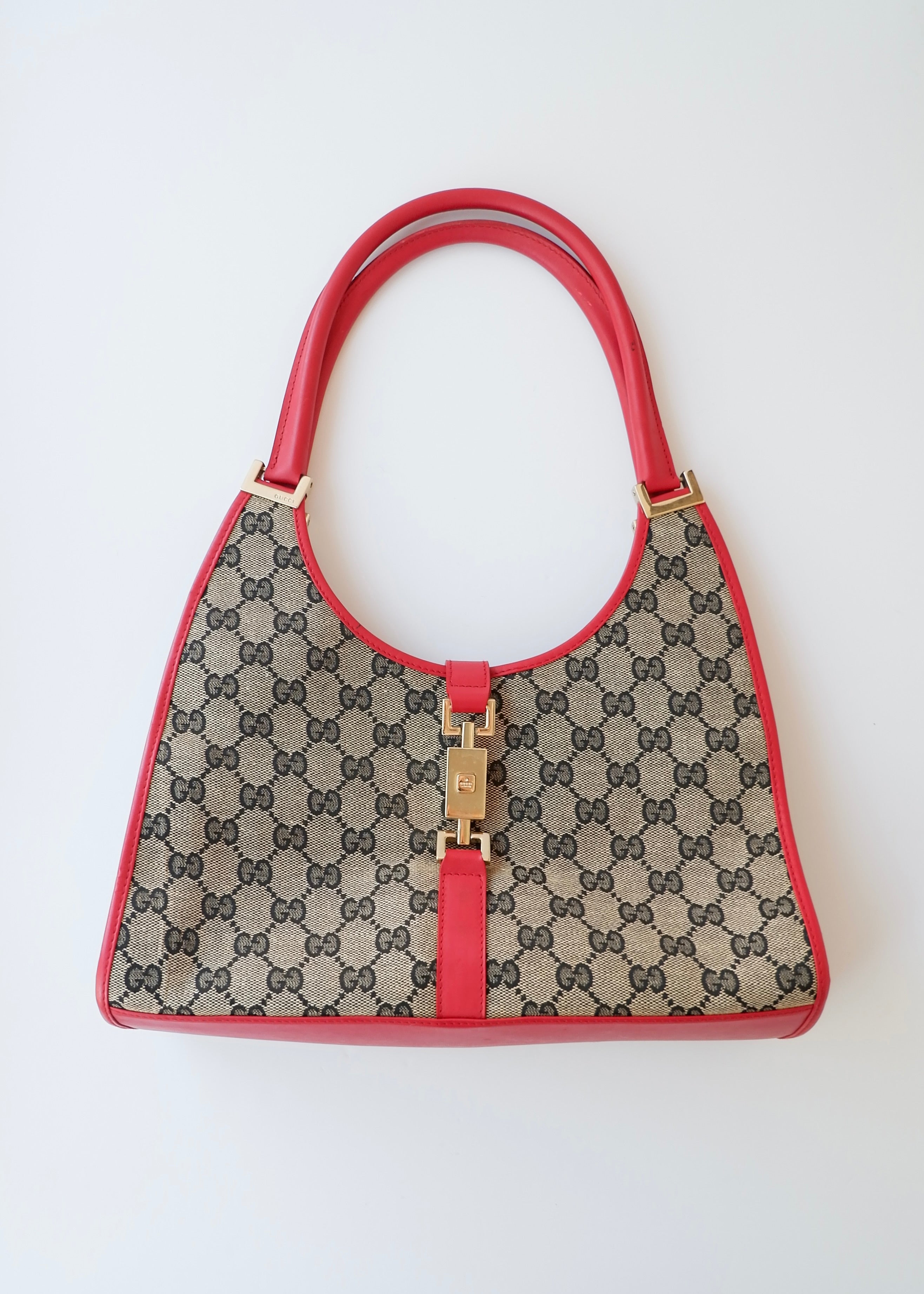 Preowned Gucci Red GG Canvas Jackie Piston Closure Shoulder Bag