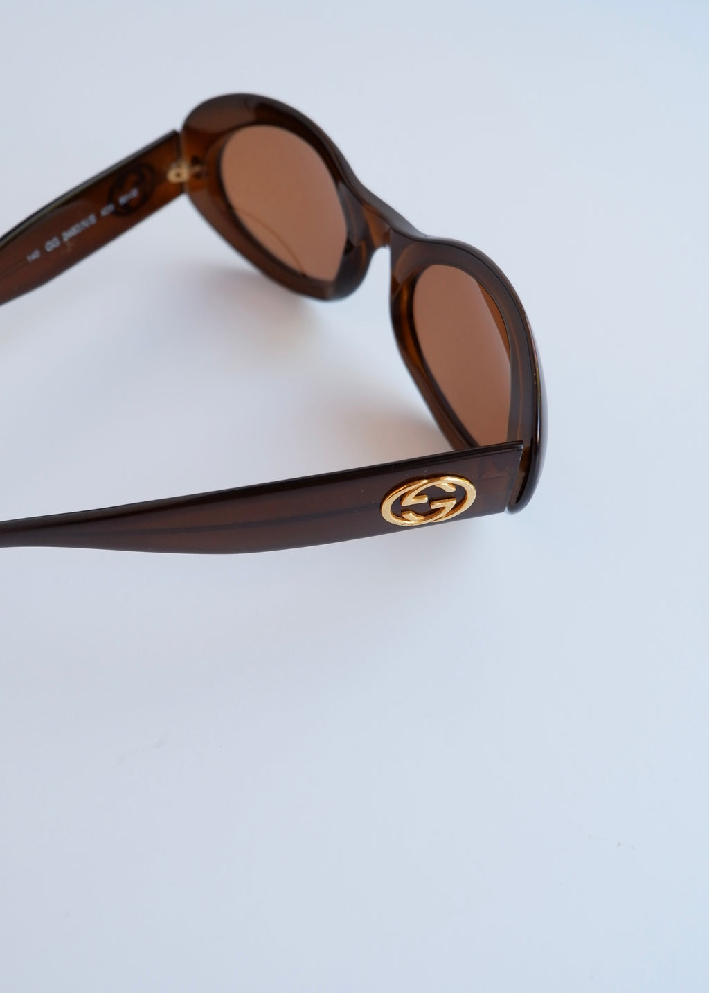 Authentiques lunettes de soleil vintage d'occasion Gucci à monture ronde en acétate marron