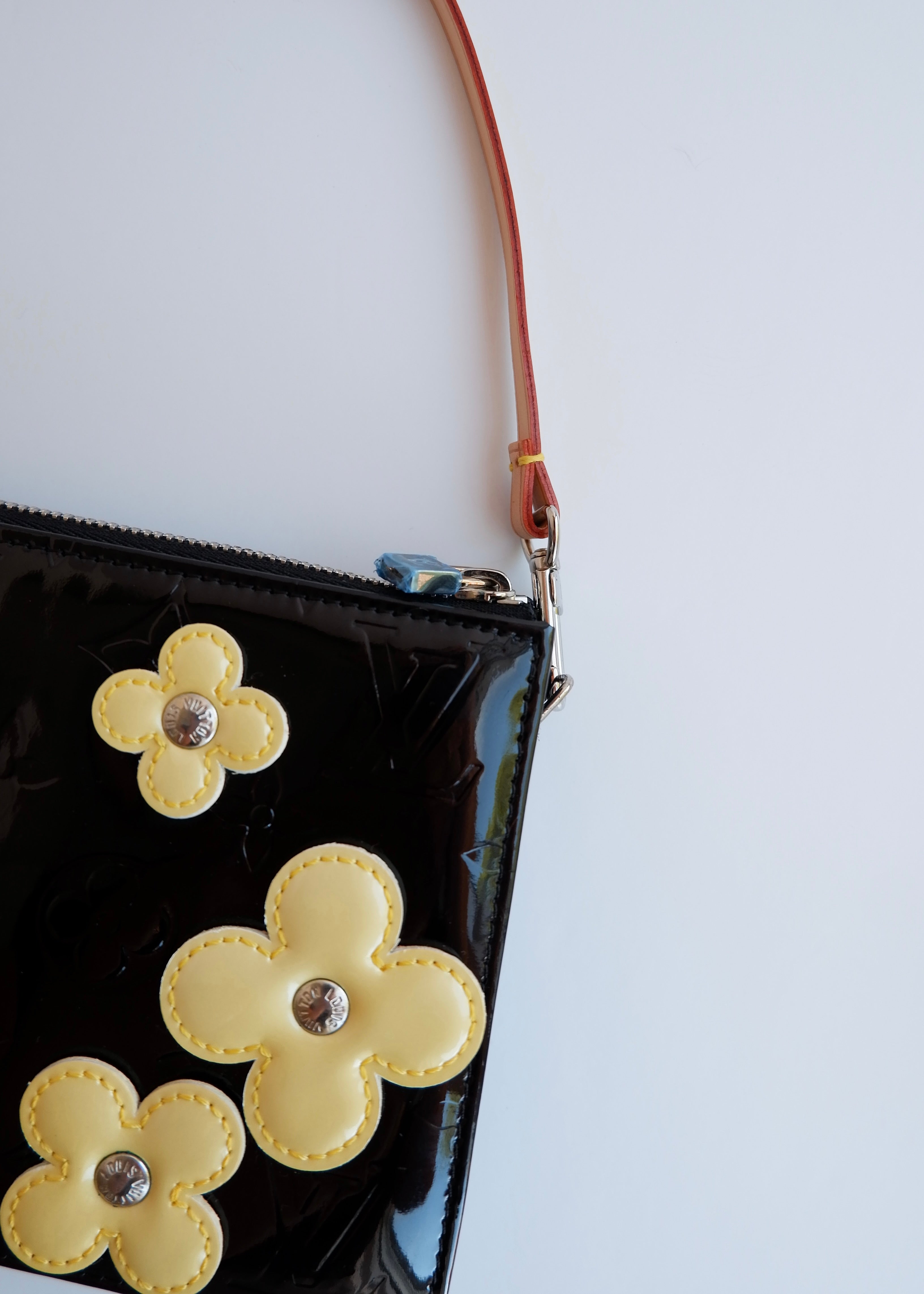 Pochette Louis Vuitton Lexington en Vernis Amarante Fleuri authentique d'occasion
