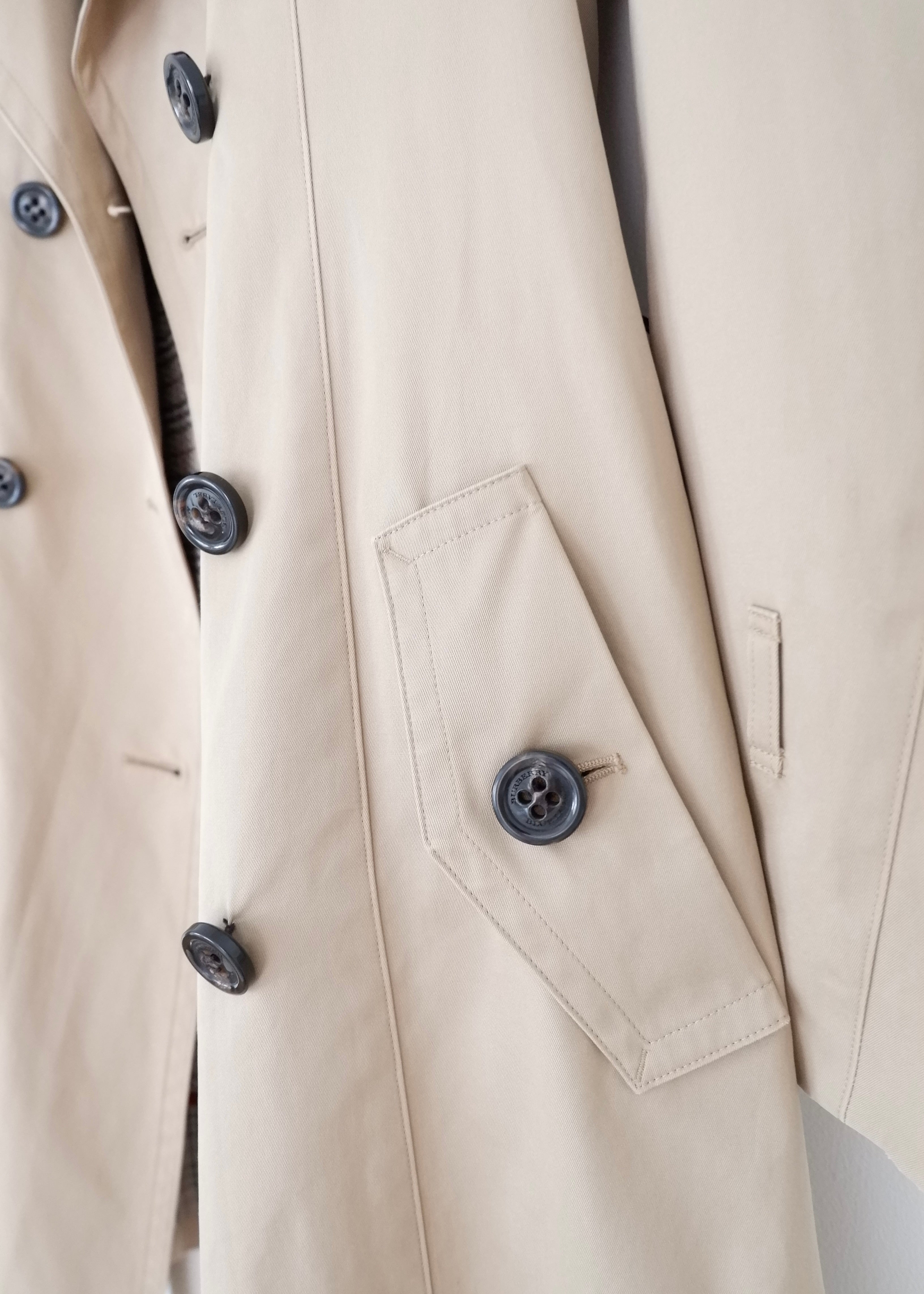 Trench-coat mi-long beige Burberry d'occasion authentique - T.S