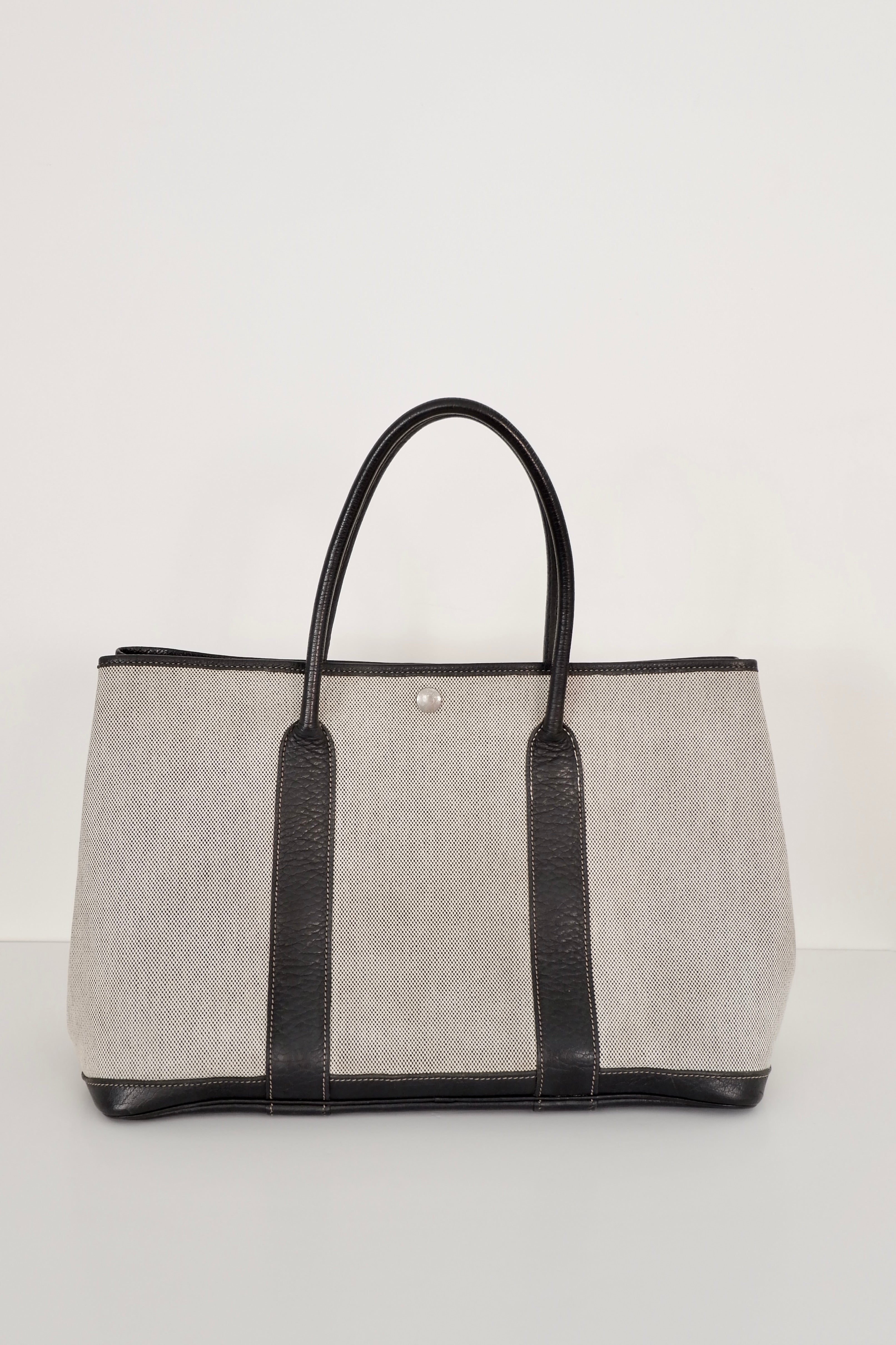 Sac cabas Hermès Garden Party authentique d'occasion en cuir et toile noirs/gris