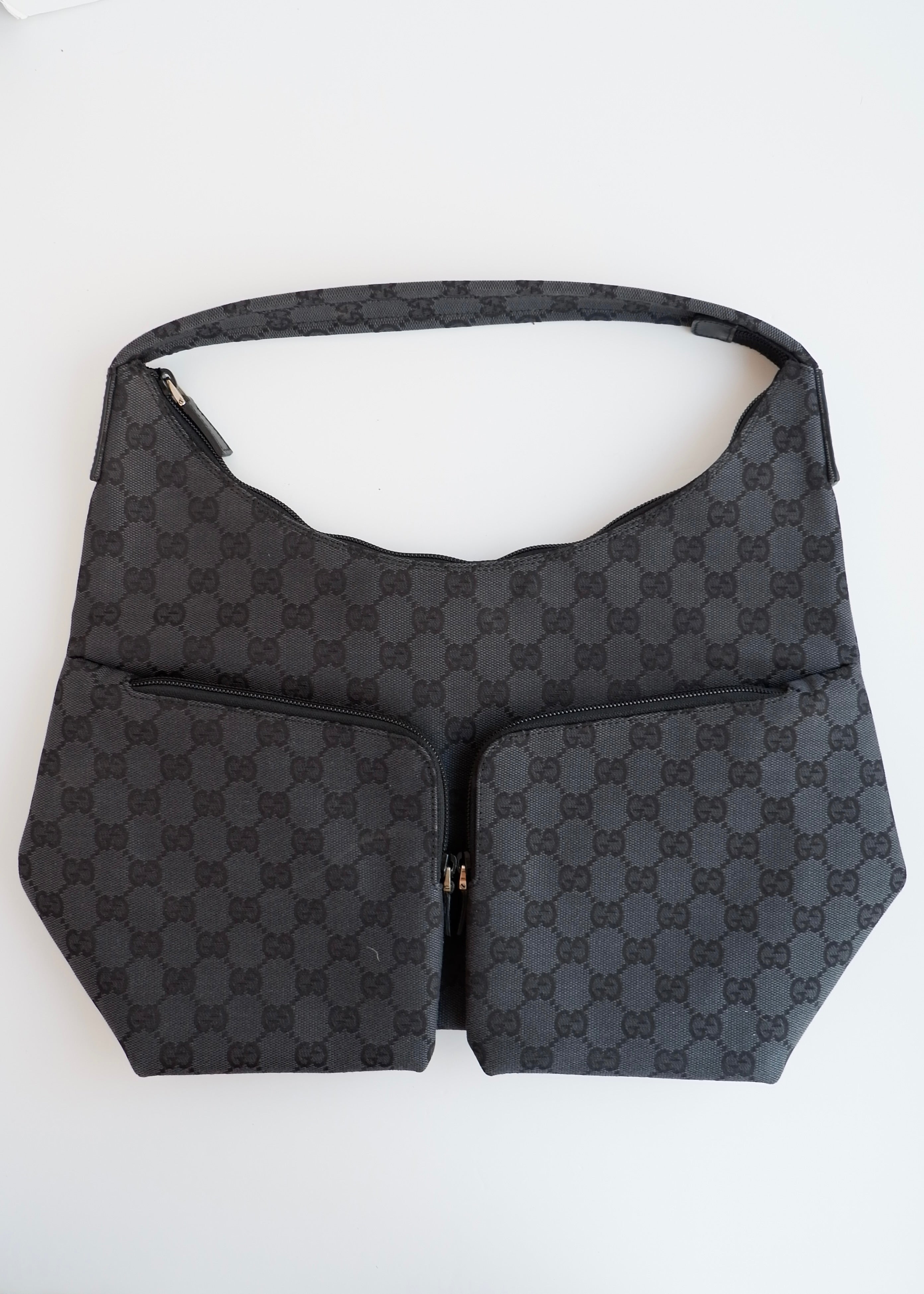 Authentique Sac à bandoulière Gucci en toile GG noire d'occasion