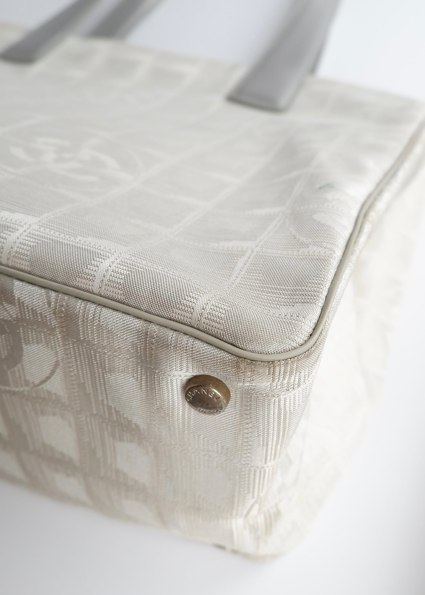 Authentic Preowned Chanel Silver Canvas New Travel Line Tote Bag