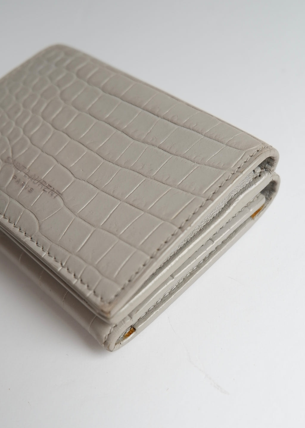 Preowned Saint Laurent Grey Leather Embossed Compact Wallet