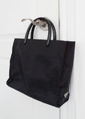 Sac à main Prada d'occasion authentique en nylon noir avec anse en acétate