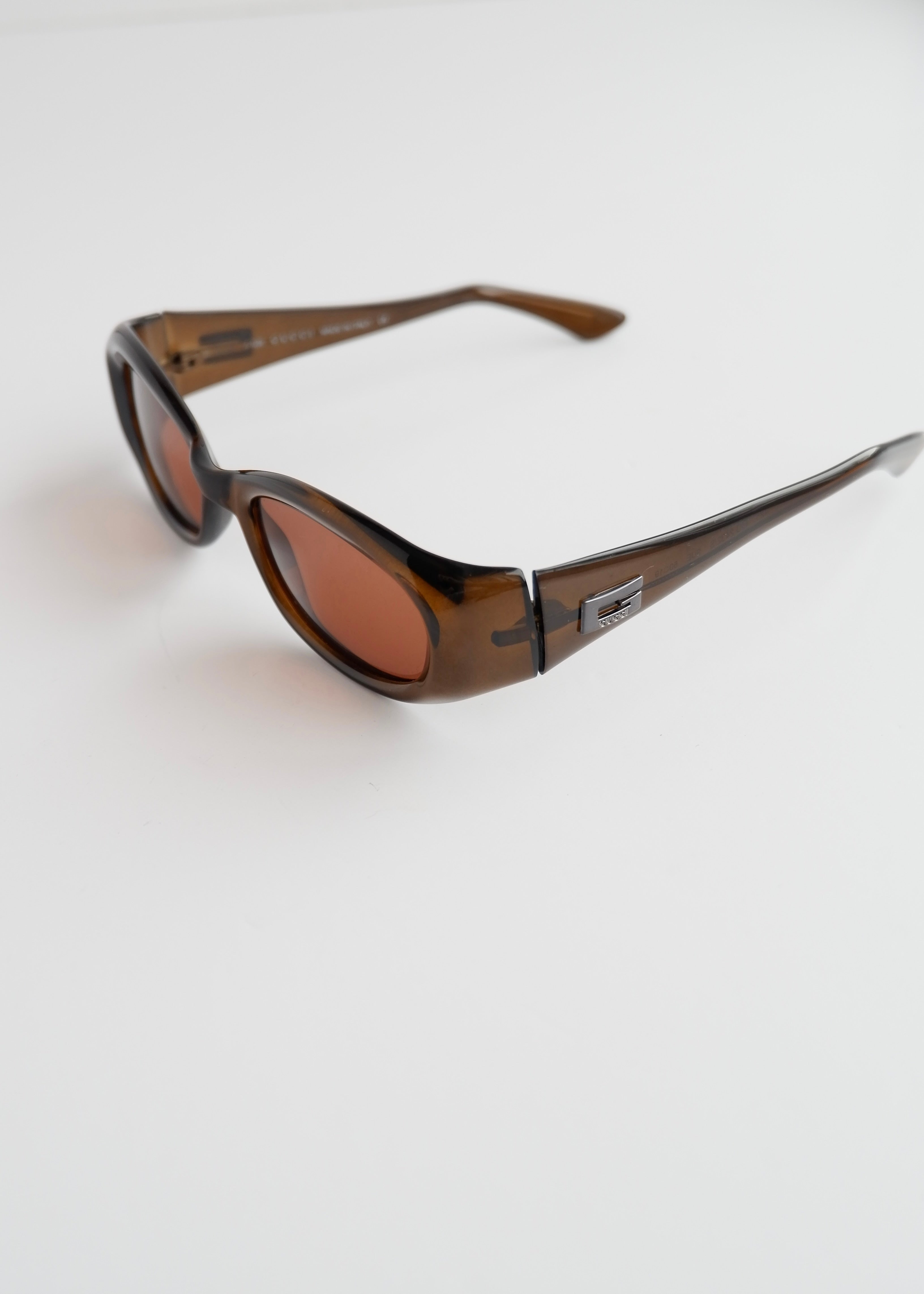 Authentiques lunettes de soleil Gucci d'occasion en acétate marron à monture carrée