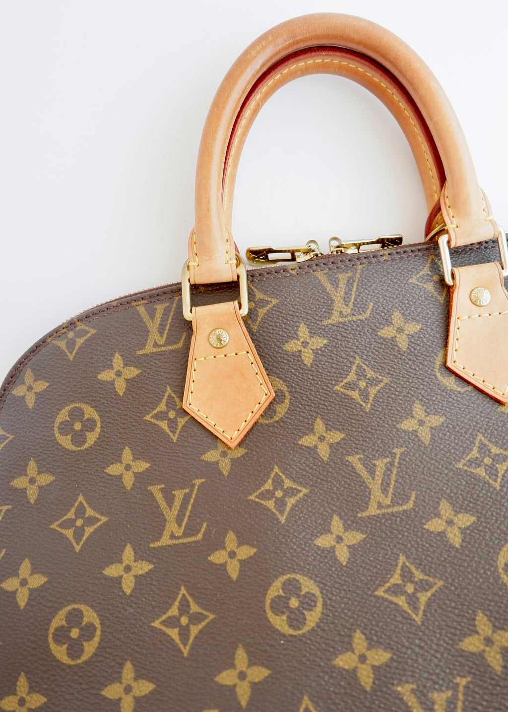 Sac à main Louis Vuitton Alma Monogram d'occasion authentique