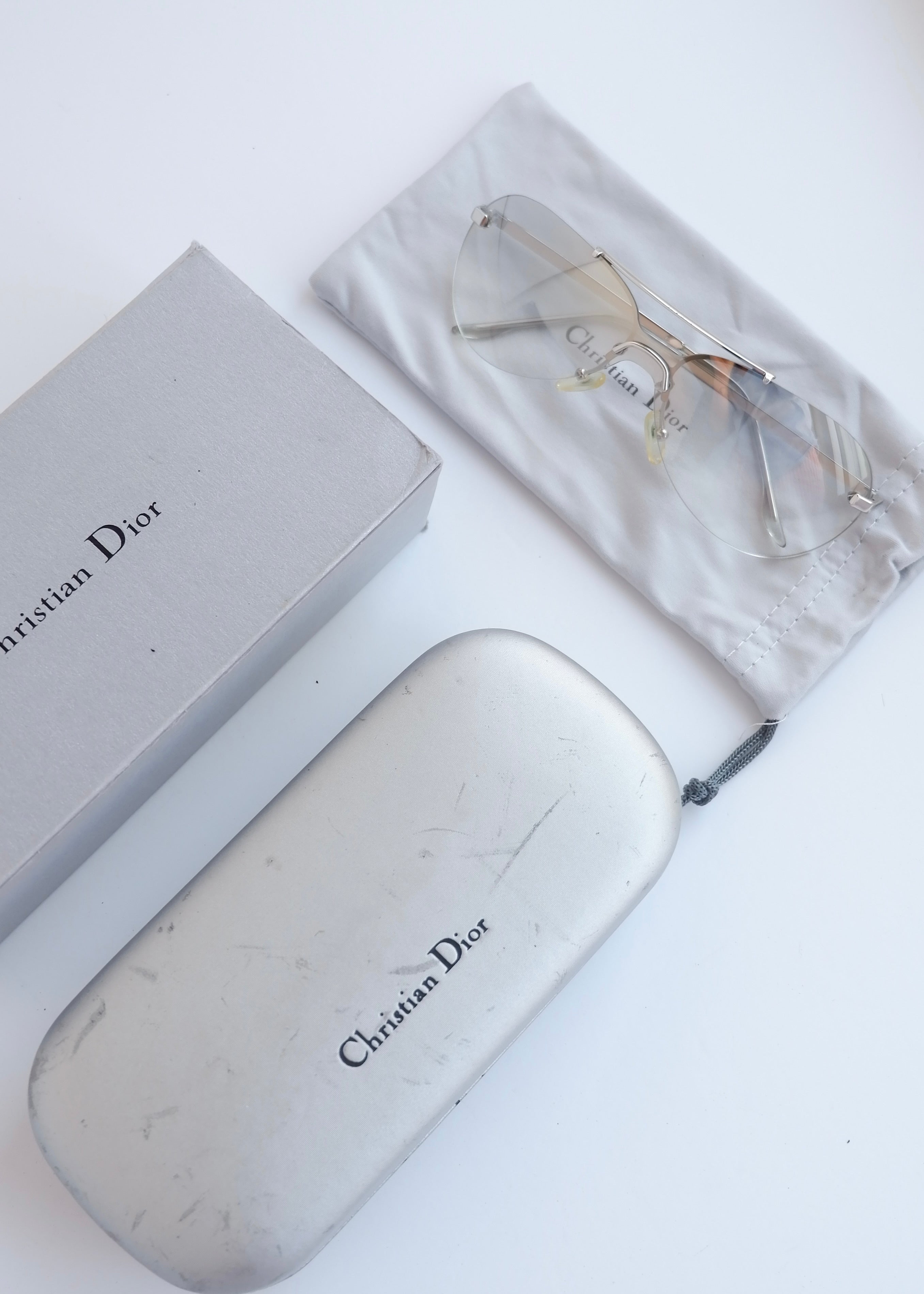 Authentiques lunettes de soleil Dior d'occasion à monture bouclier argent/transparent