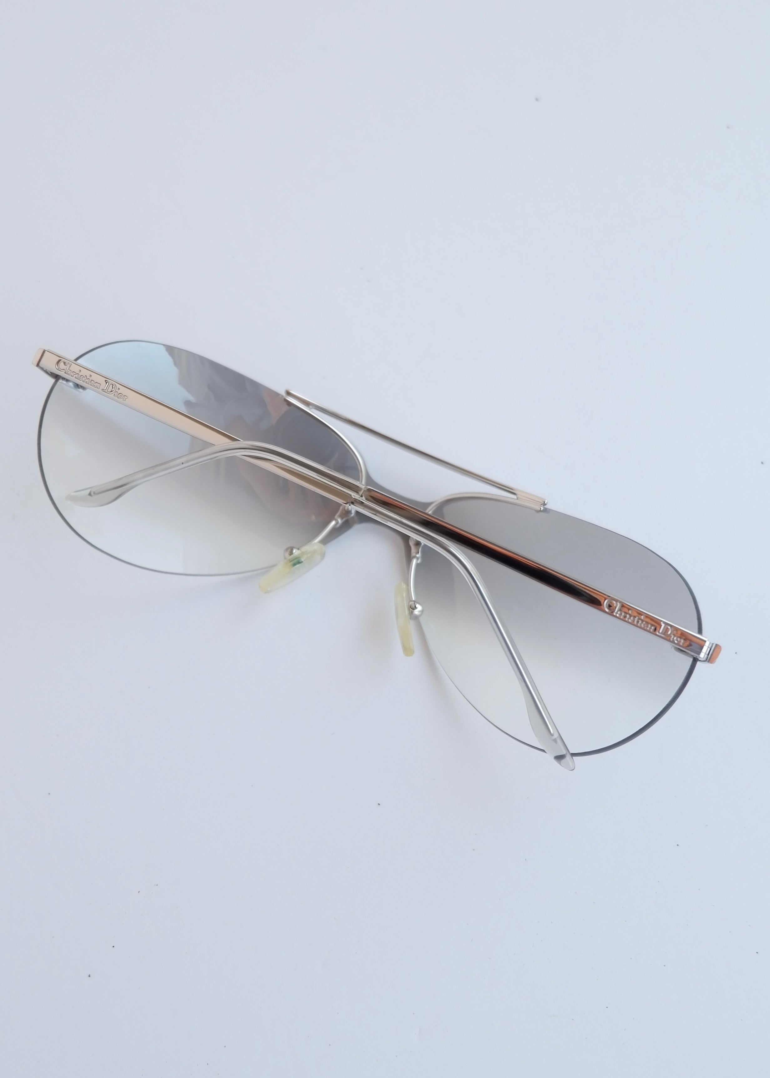 Authentiques lunettes de soleil Dior d'occasion à monture bouclier argent/transparent