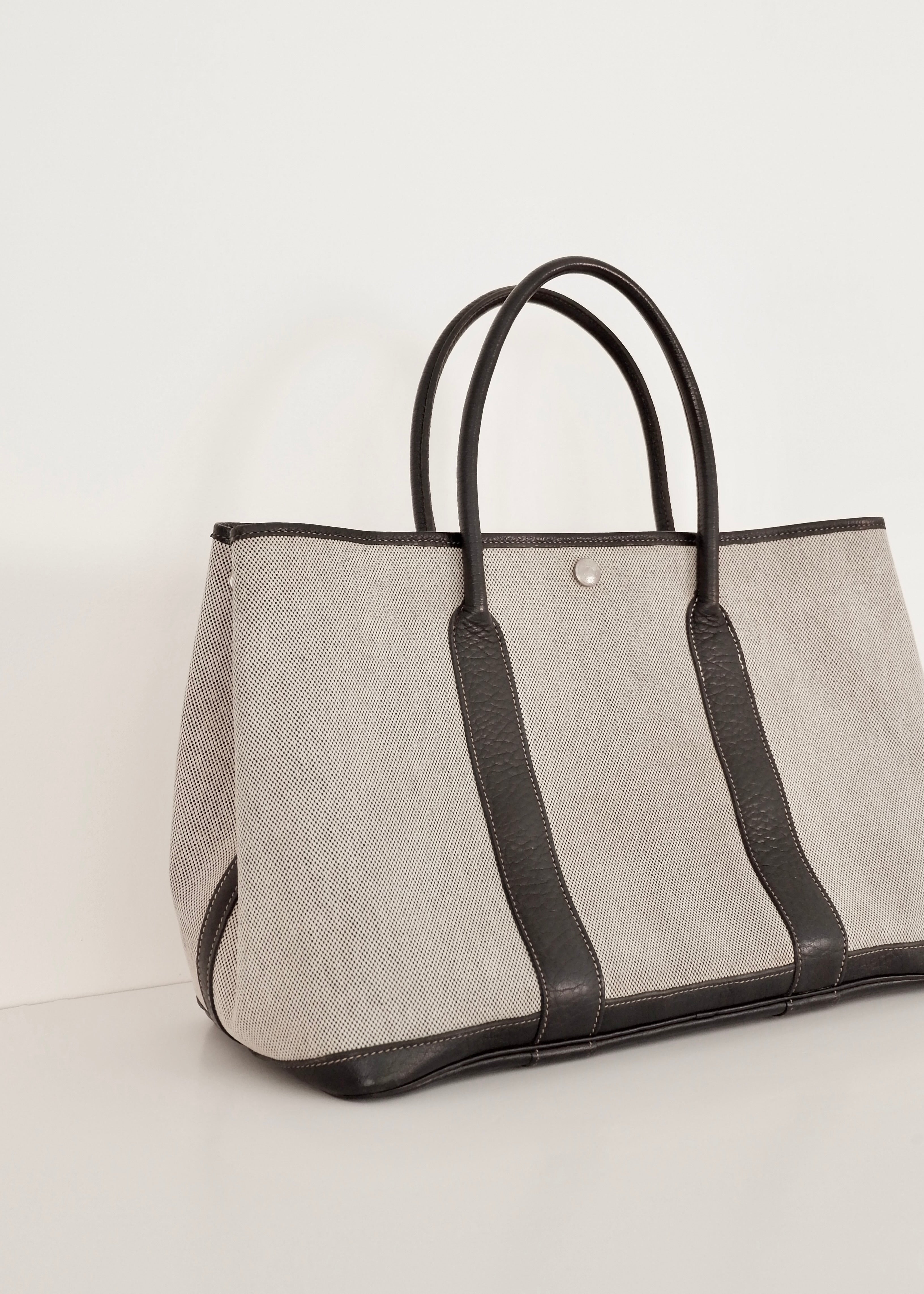 Sac cabas Hermès Garden Party authentique d'occasion en cuir et toile noirs/gris