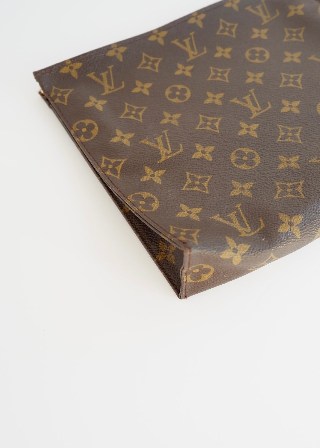 Authentique trousse de toilette monogramme Louis Vuitton d'occasion 26