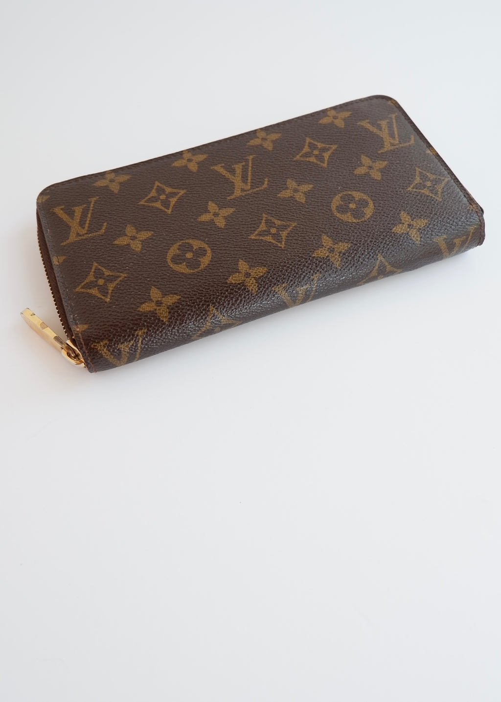 Portefeuille zippé Louis Vuitton Monogram d'occasion authentique