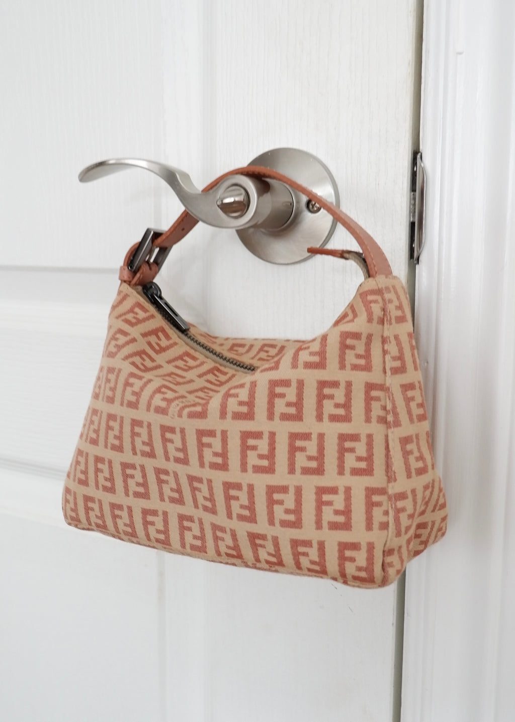 Pochette Fendi Zucchino rose poudré authentique d'occasion