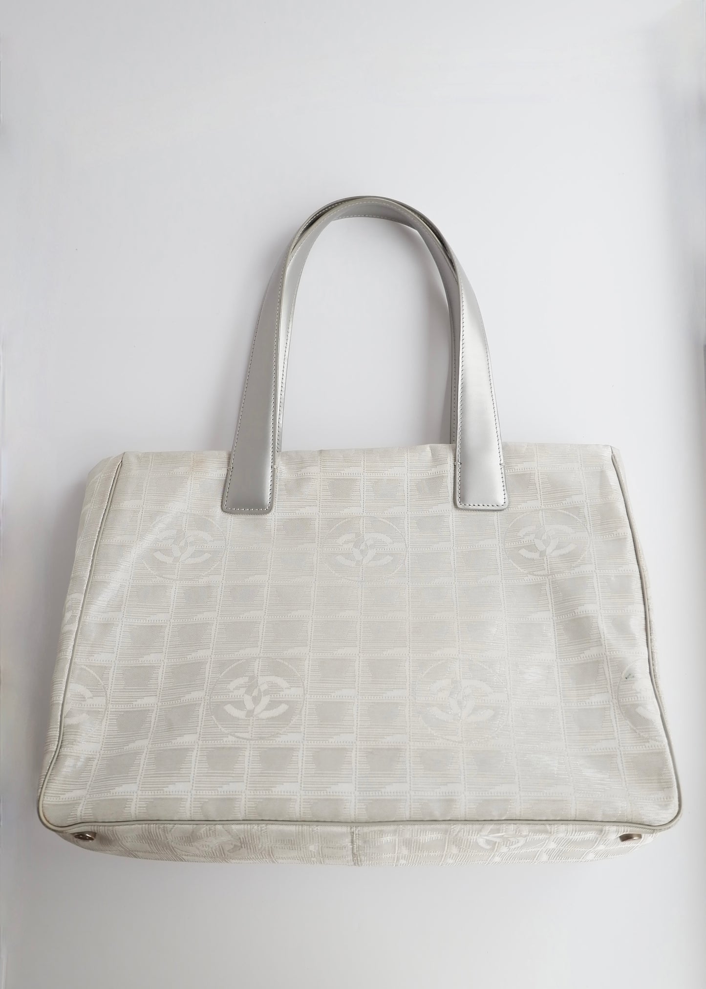 Authentic Preowned Chanel Silver Canvas New Travel Line Tote Bag