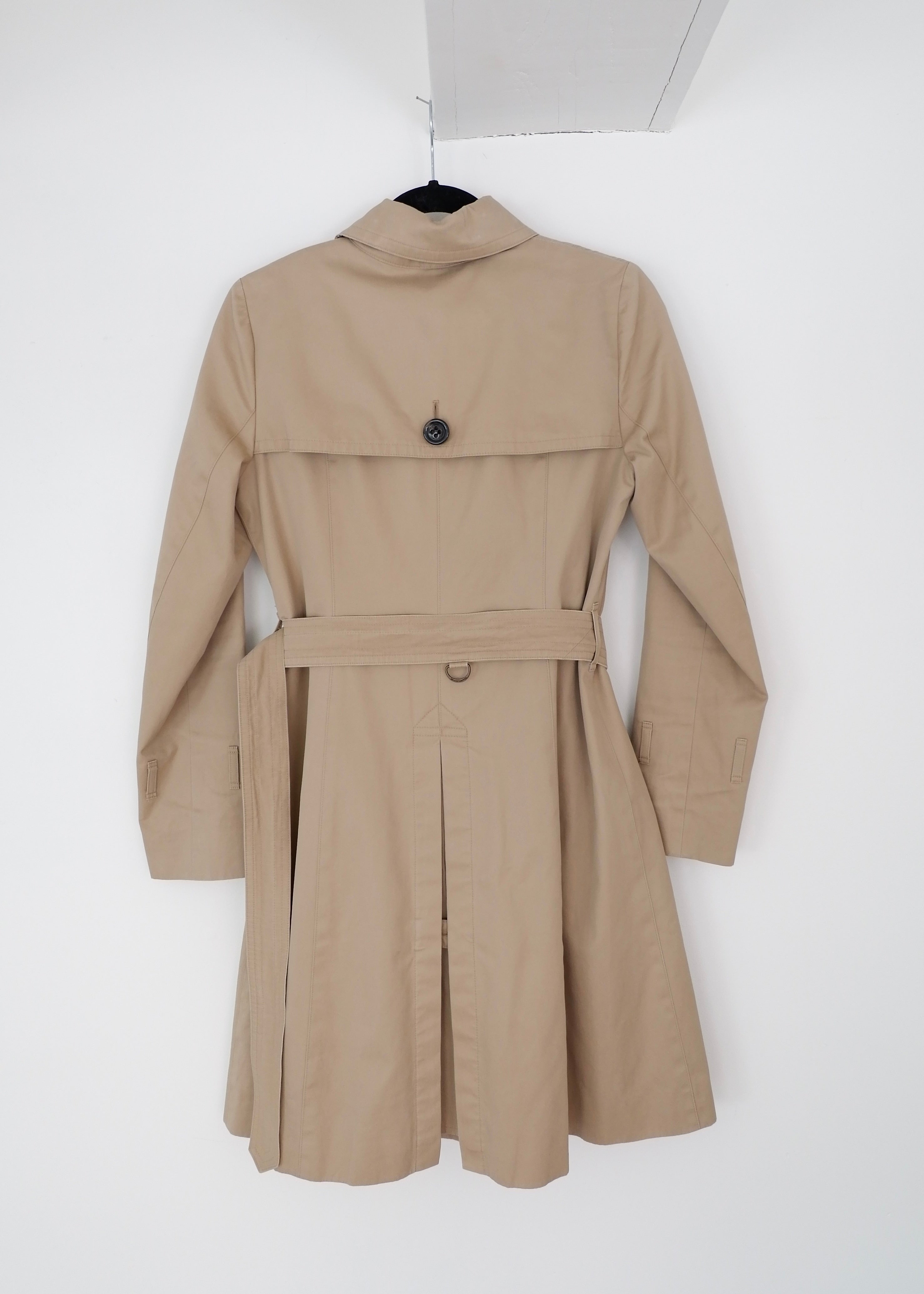 Trench-coat mi-long beige Burberry d'occasion authentique - T.S