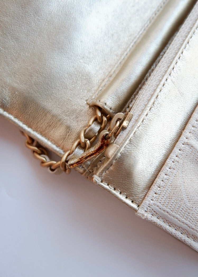 Authentic Preowned Chanel Gold Canvas New Travel Line WOC Bag