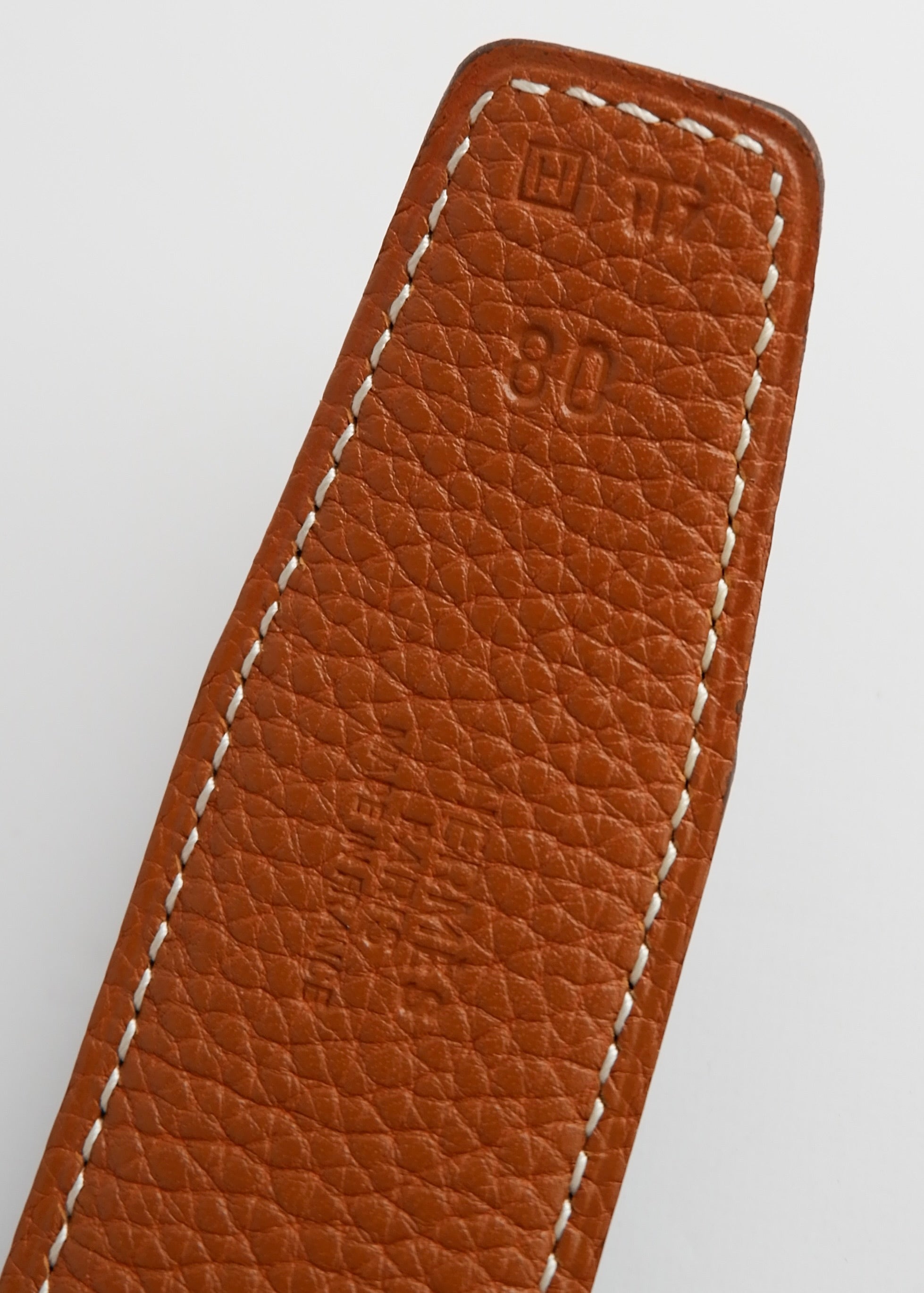 Ceinture réversible en cuir H Hermès noire/marron authentique d'occasion - 80