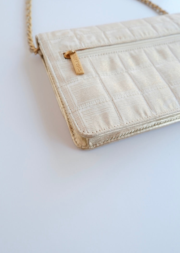 Authentic Preowned Chanel Gold Canvas New Travel Line WOC Bag