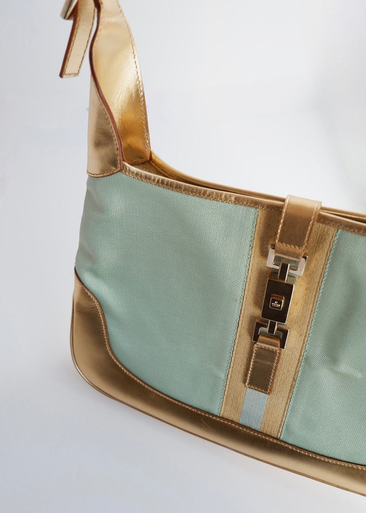 Authentique sac à bandoulière Gucci Jackie bleu/doré d'occasion