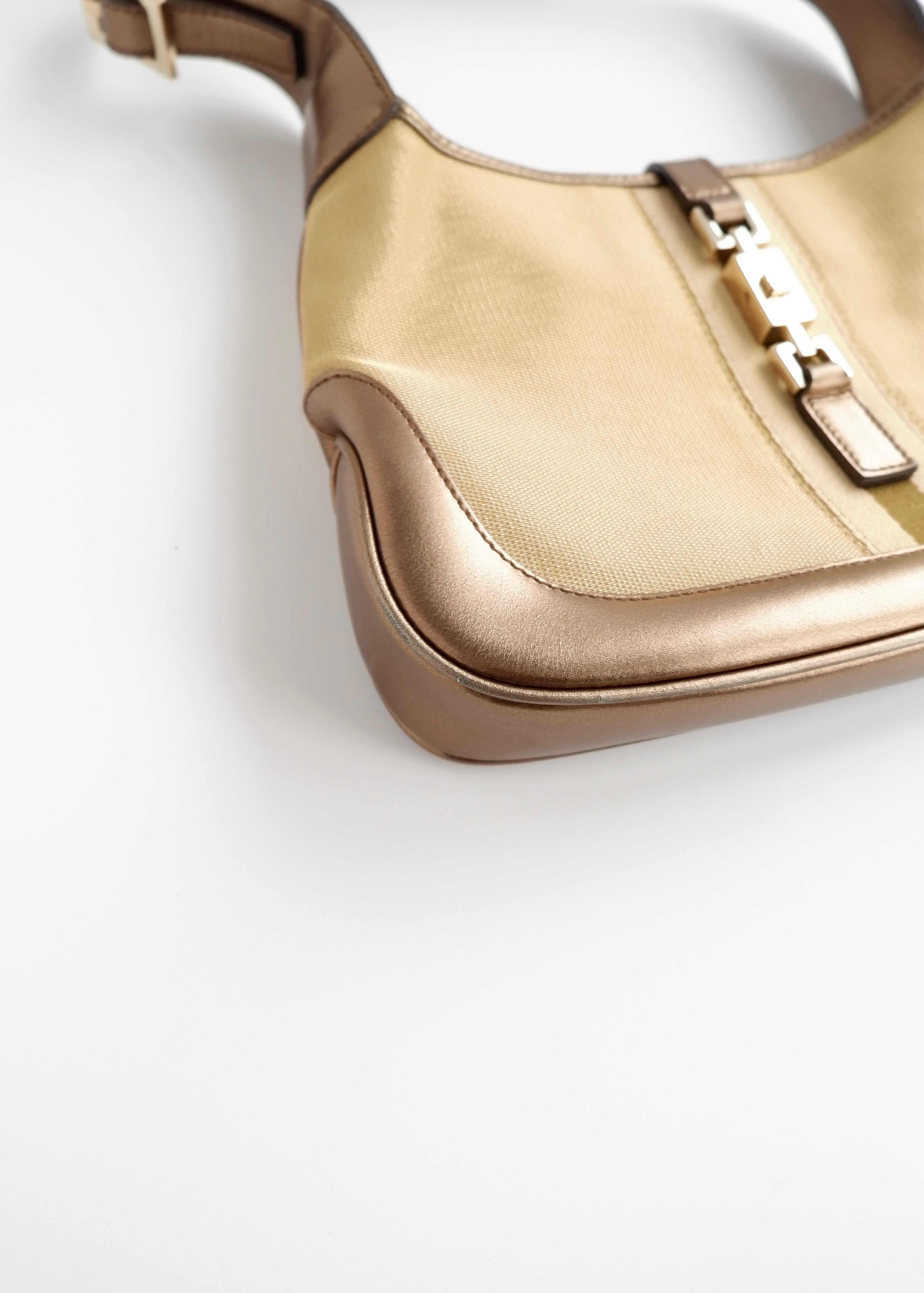 Authentique Sac Jackie Gucci d'occasion en Toile et Cuir Doré/Beige