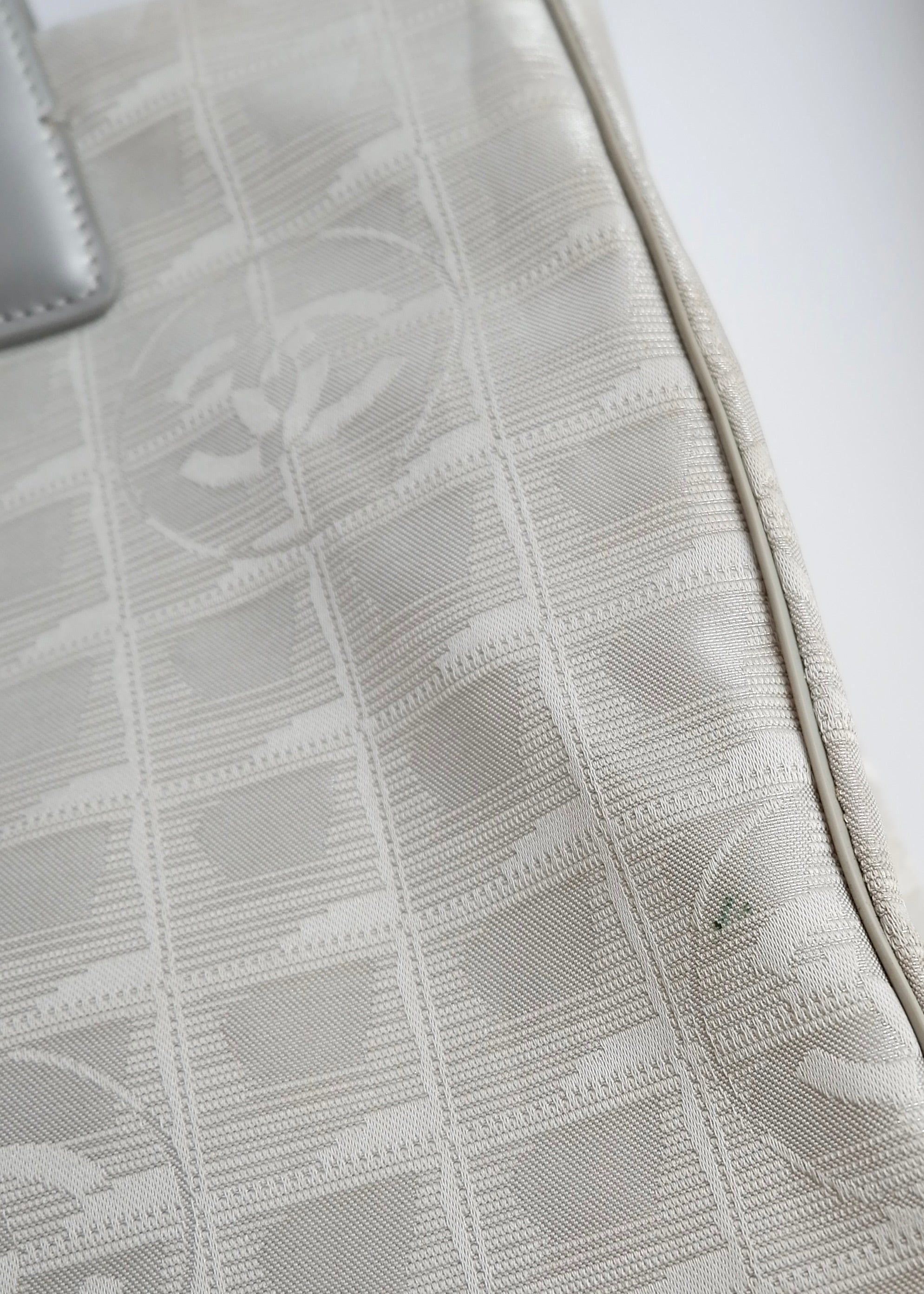 Authentic Preowned Chanel Silver Canvas New Travel Line Tote Bag