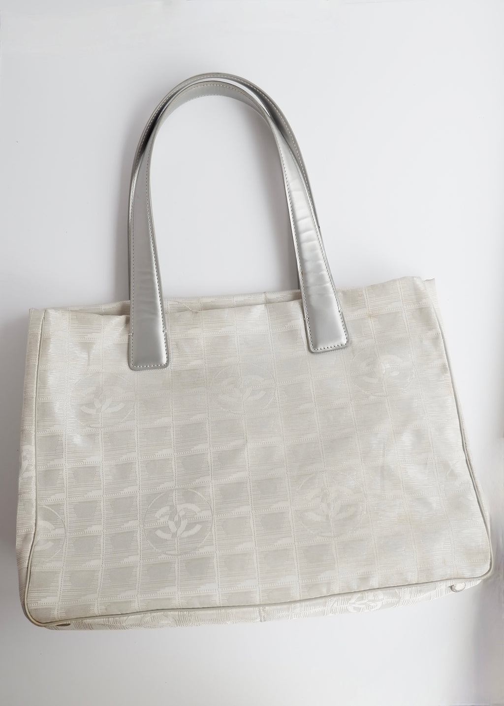 Authentic Preowned Chanel Silver Canvas New Travel Line Tote Bag